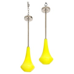 1960's Pair of Canary Yellow Glass Pendant lights.