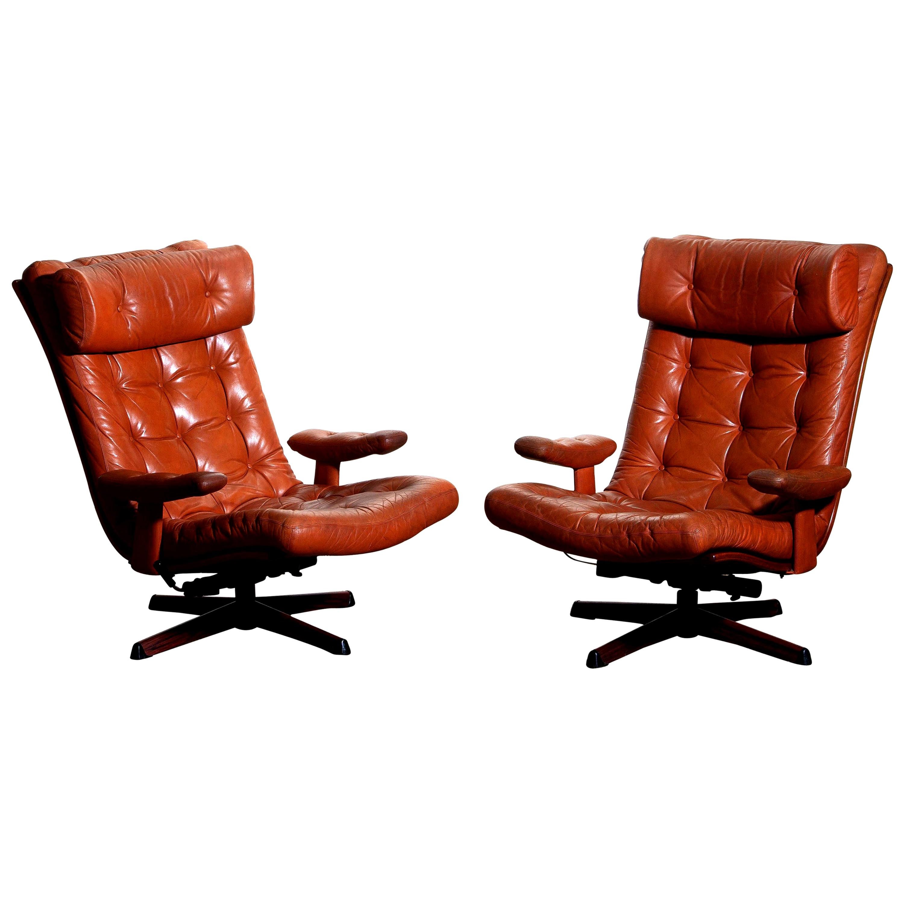 Swedish 1960s Pair of Cognac Leather Swivel and Relax Lounge Chairs, Göte Design Nässjö