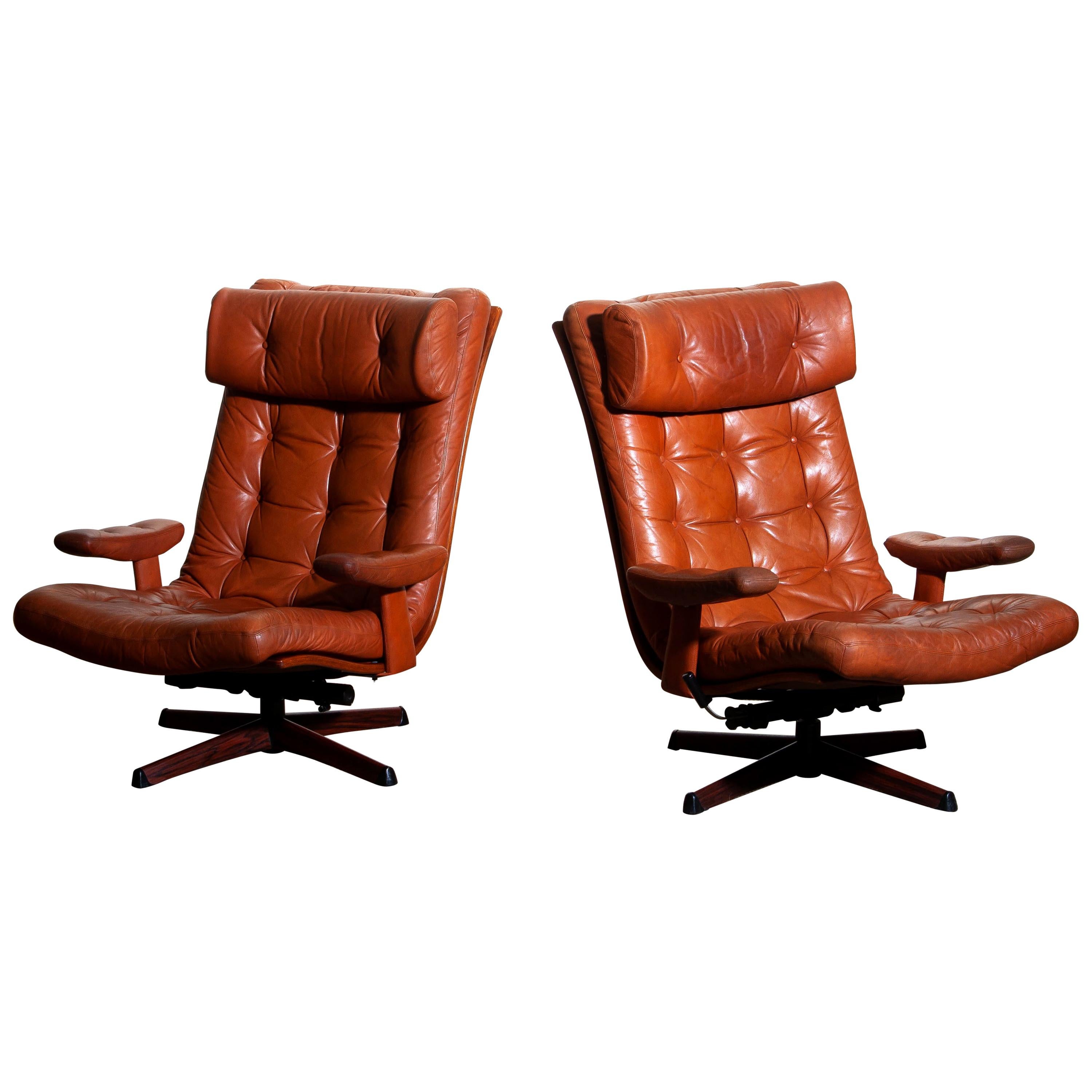 Swedish 1960s Pair of Cognac Leather Swivel / Relax Lounge Chairs by Göte Design Nässjö