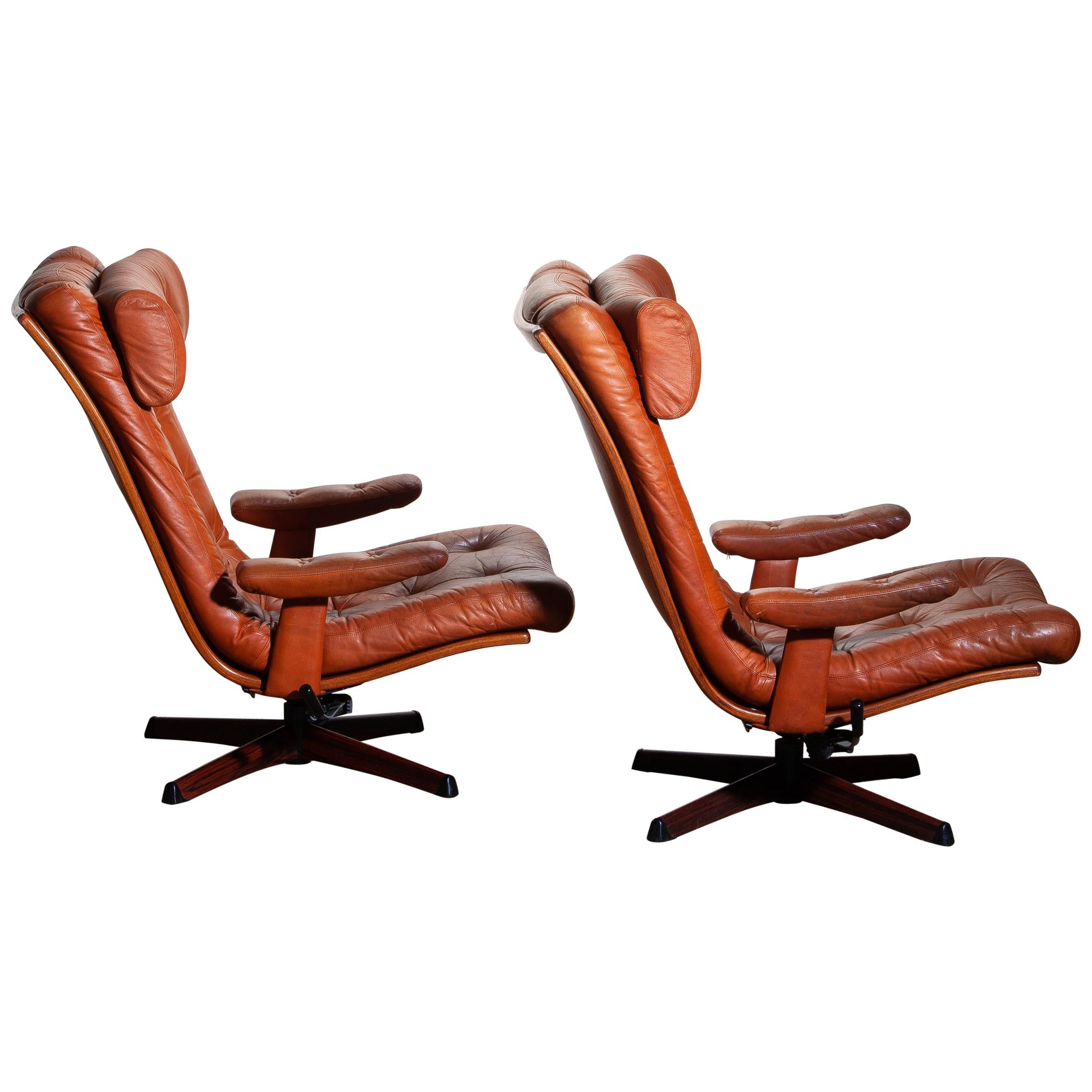 Swedish 1960s Pair of Cognac Leather Swivel / Relax Lounge Chairs by Göte Design Nässjö