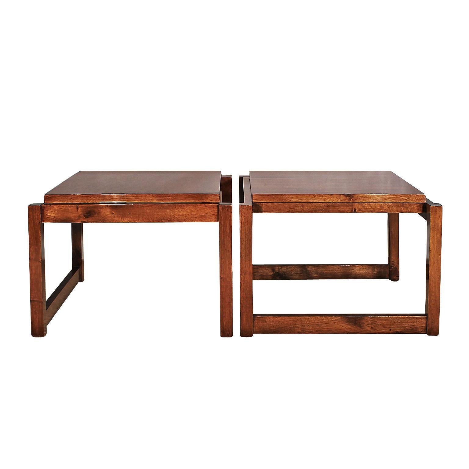 Pair of Cubist style coffee tables, solid walnut and walnut veneer, French polish.
France, 1960-1970.