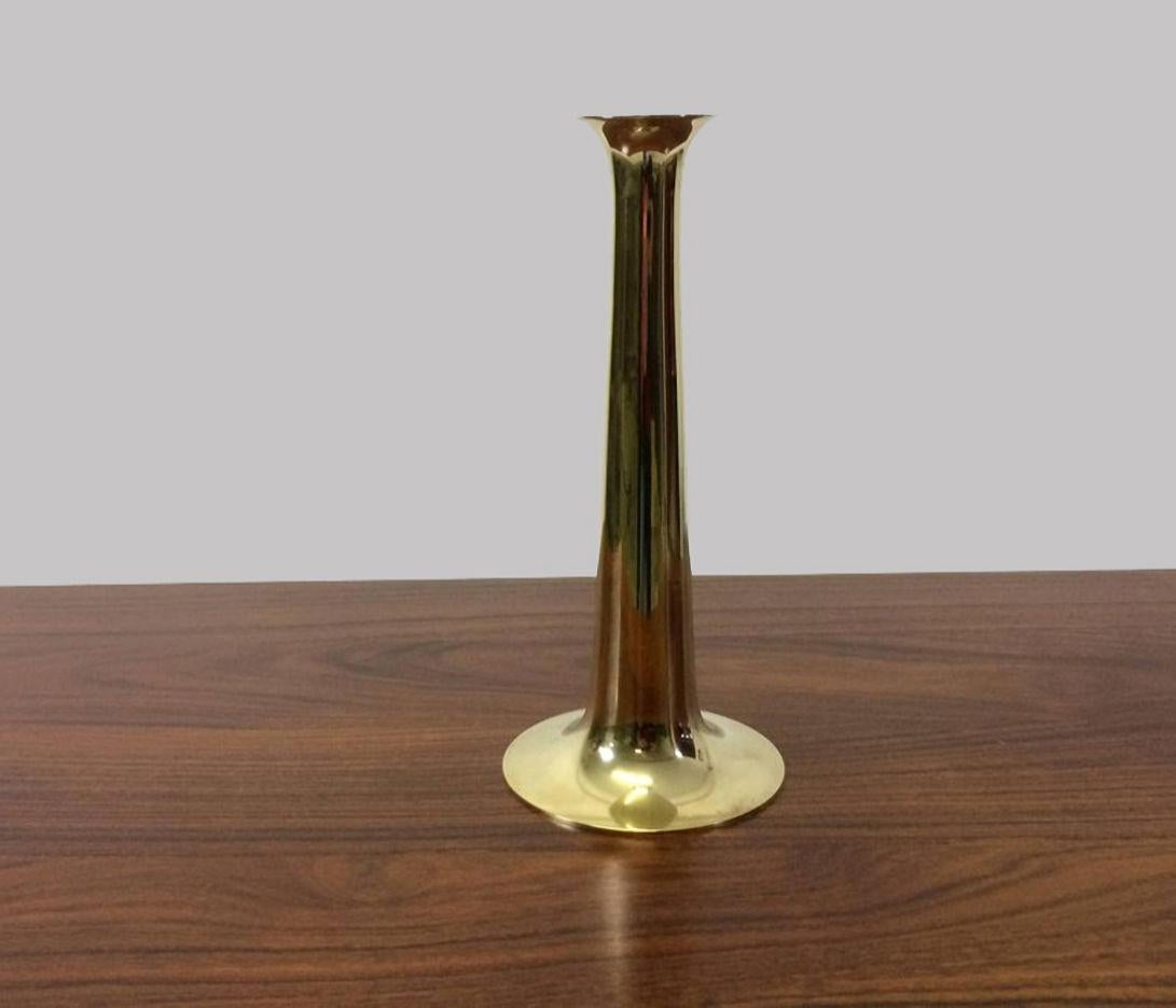 Pair of Danish solid brass candlesticks designed by Hans Bølling and manufactured by Torben Ørskov in the 1960s with manufacturer's mark on each base.

The candlesticks are in good vintage condition with only minor signs of age and use.