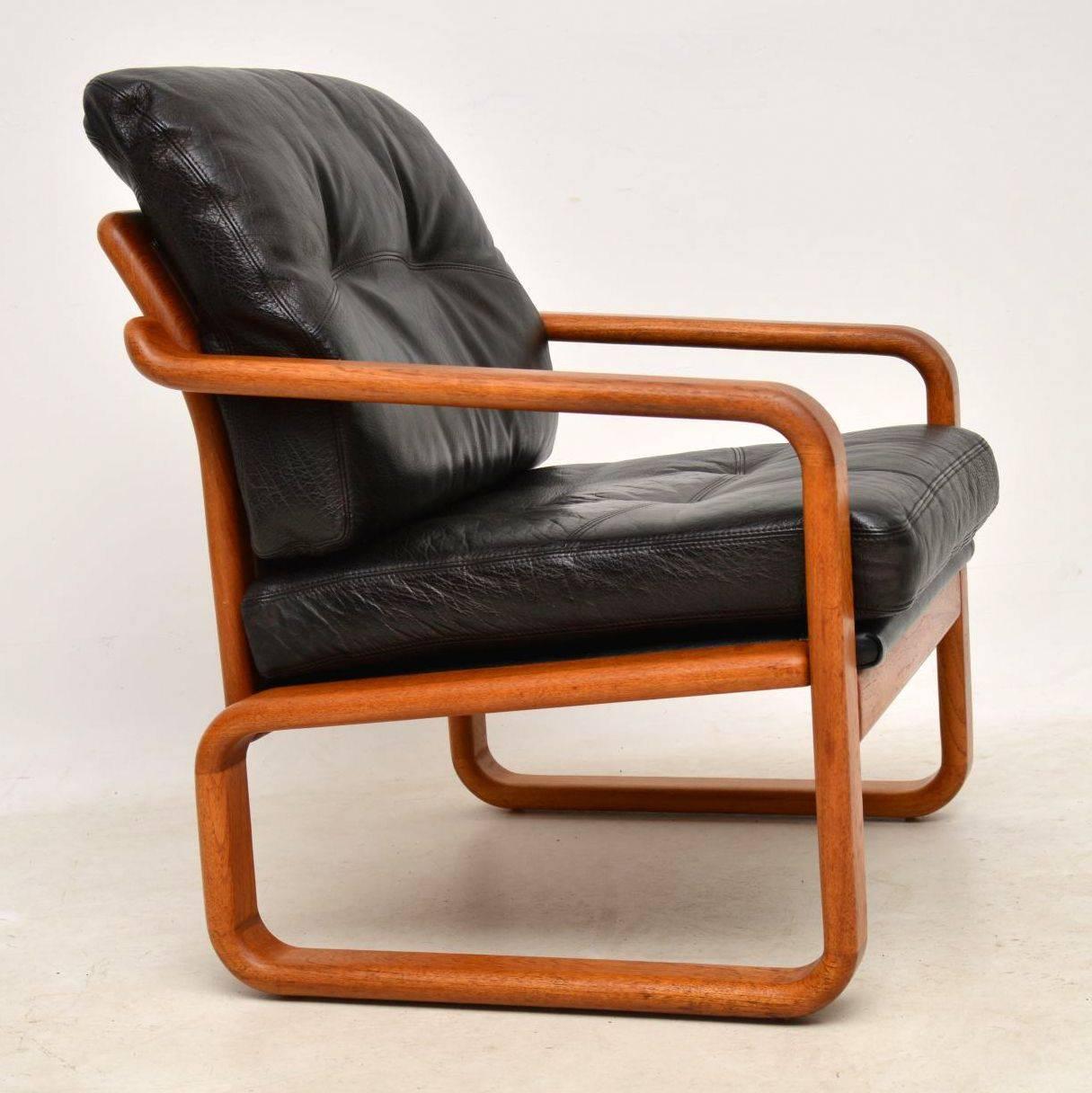 Mid-20th Century 1960s Pair of Danish Leather and Teak Armchairs