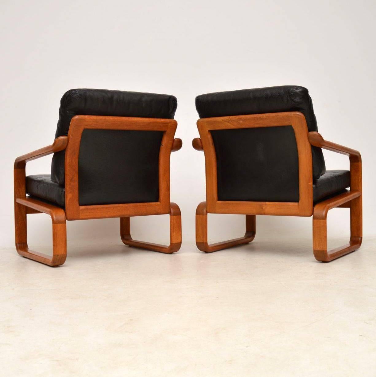 1960s Pair of Danish Leather and Teak Armchairs 4