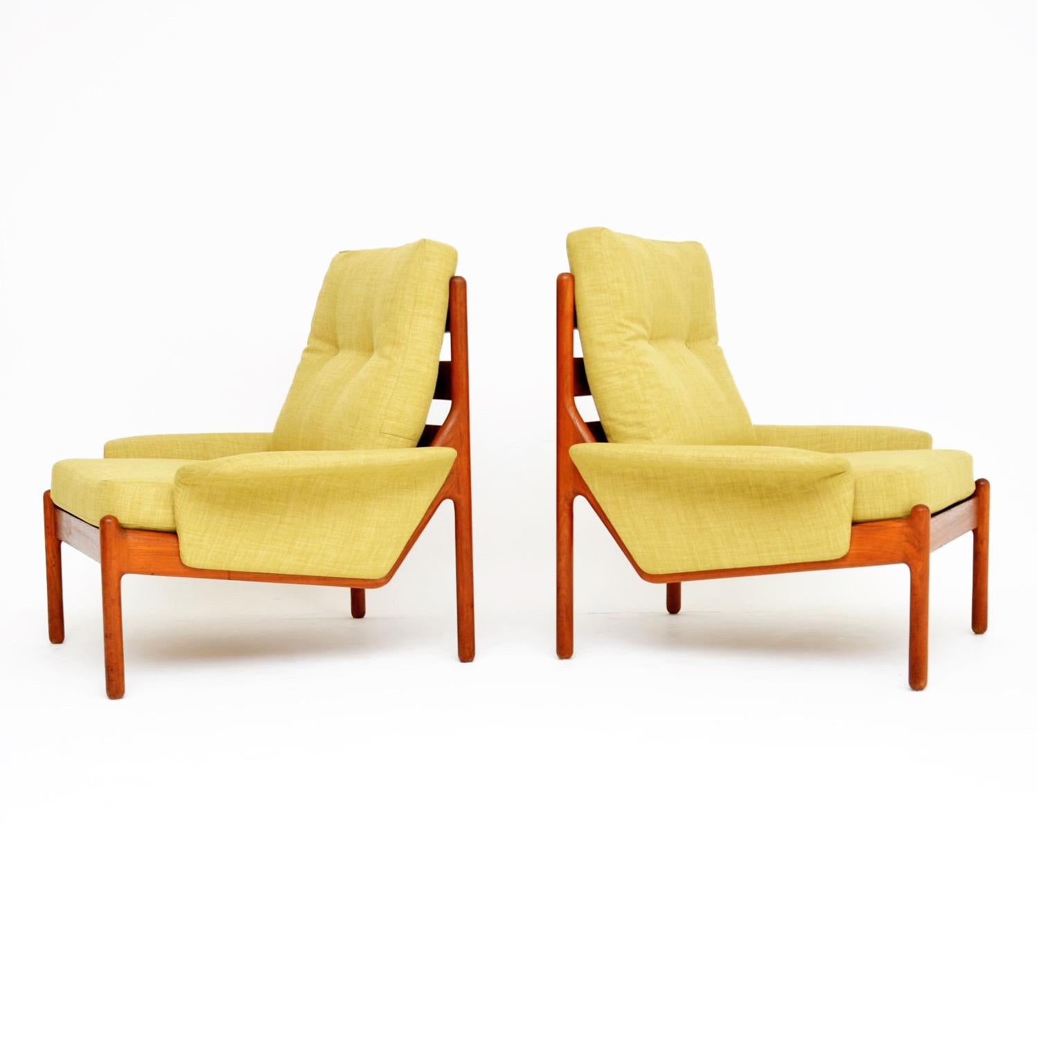 A stylish and extremely comfortable pair of Danish armchairs in solid teak. These were designed by Johannes Andersen and were made in Denmark by Silkeborg. They date from the 1960s, and are in superb condition for their age. We have had these fully