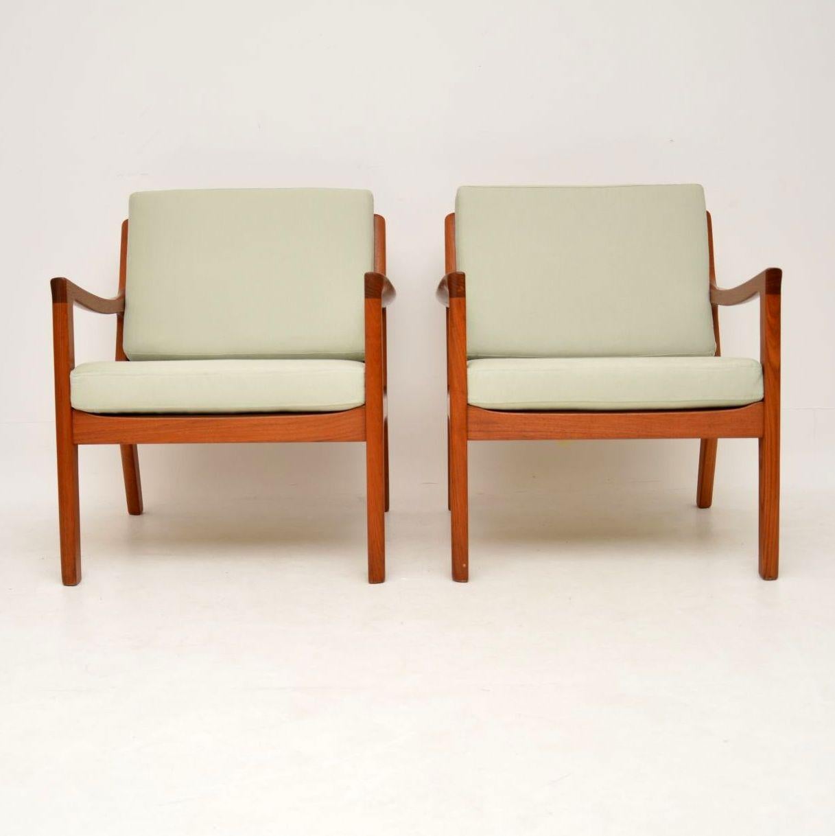 A stunning pair of Danish armchairs in solid teak, this model is called the ‘Senator’, it was designed by Ole Wanscher and was made by Cado in the 1960s-1970s. They are in excellent condition for their age, the teak frames are clean, sturdy and