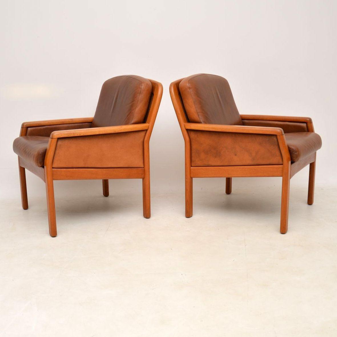 Mid-20th Century 1960s Pair of Danish Teak and Leather Armchairs