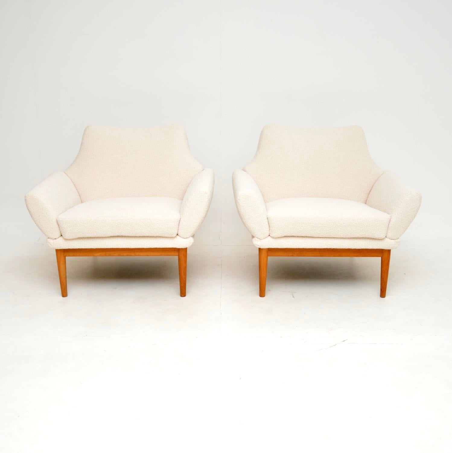 An absolutely stunning pair of vintage Danish armchairs, designed by Johannes Andersen. This model is called the ‘Hollywood’, they were made in Denmark by Trensums and dates from around the 1960’s.

They are of amazing quality and have an
