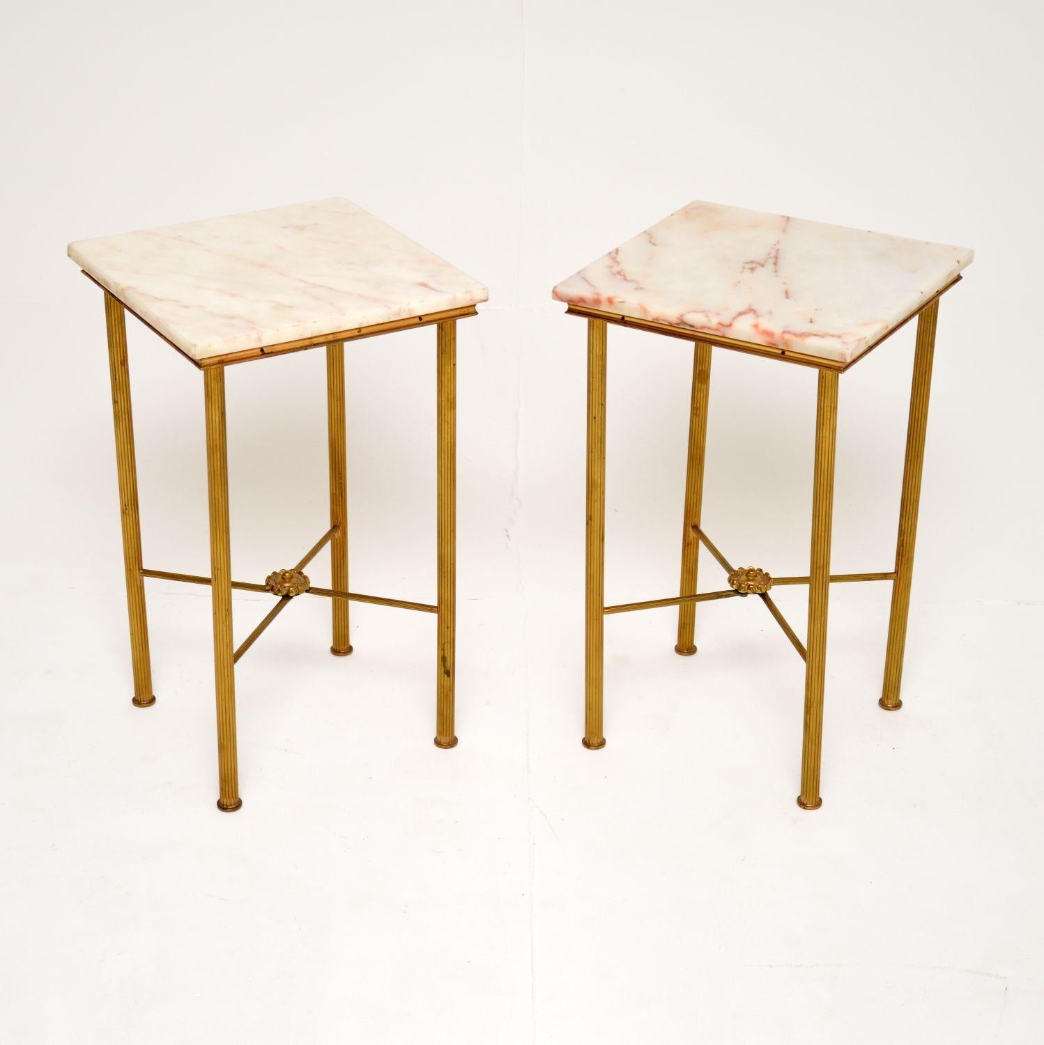 A beautiful pair of brass side tables with fixed marble tops. These were made in France, they date from around the 1960-70’s.

They are very well made and are a lovely, compact size. The solid brass frames have fluted legs and stretchered bases,