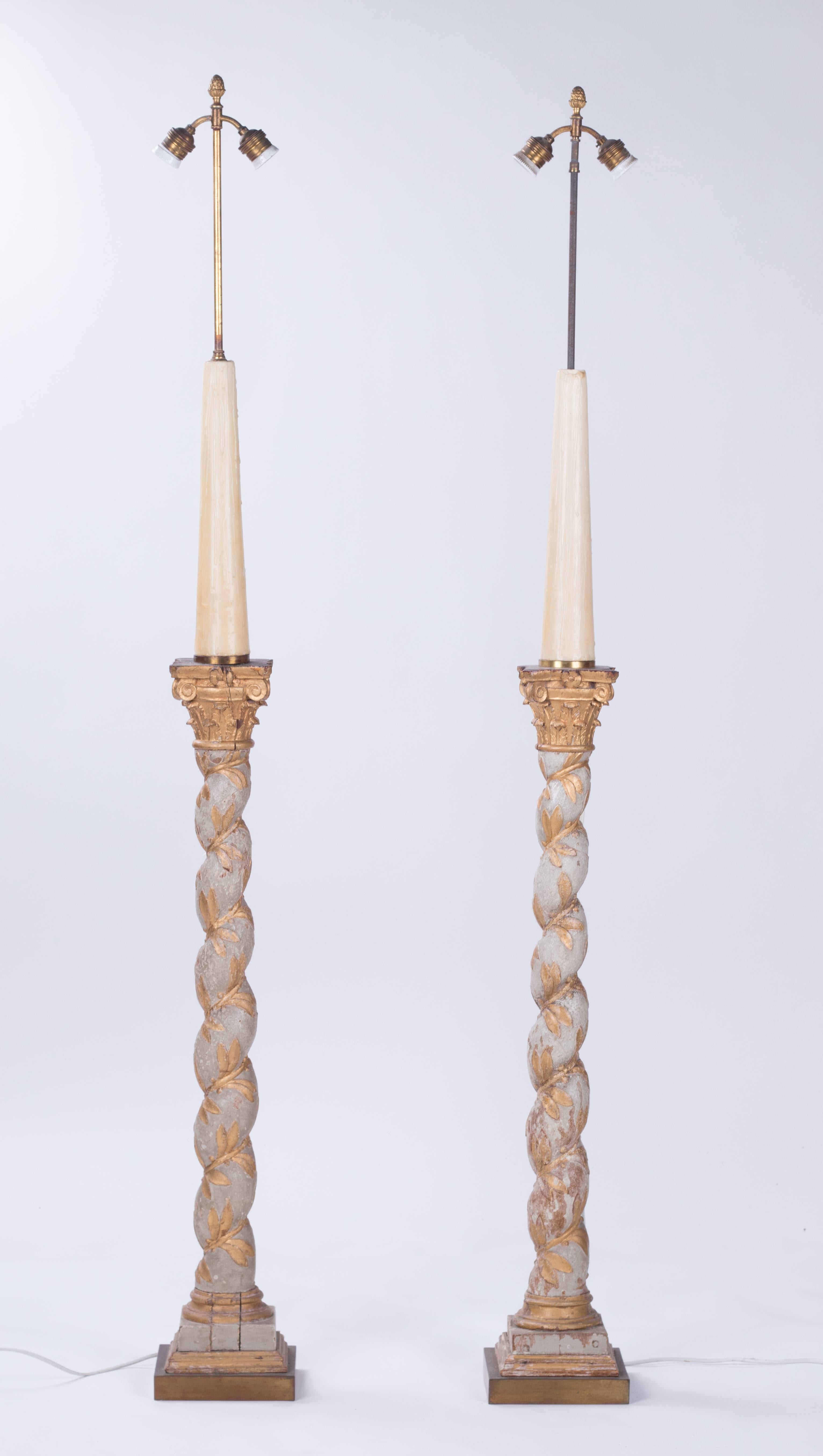 1960s pair of French polychrome hand carved wooden standing lamps.
