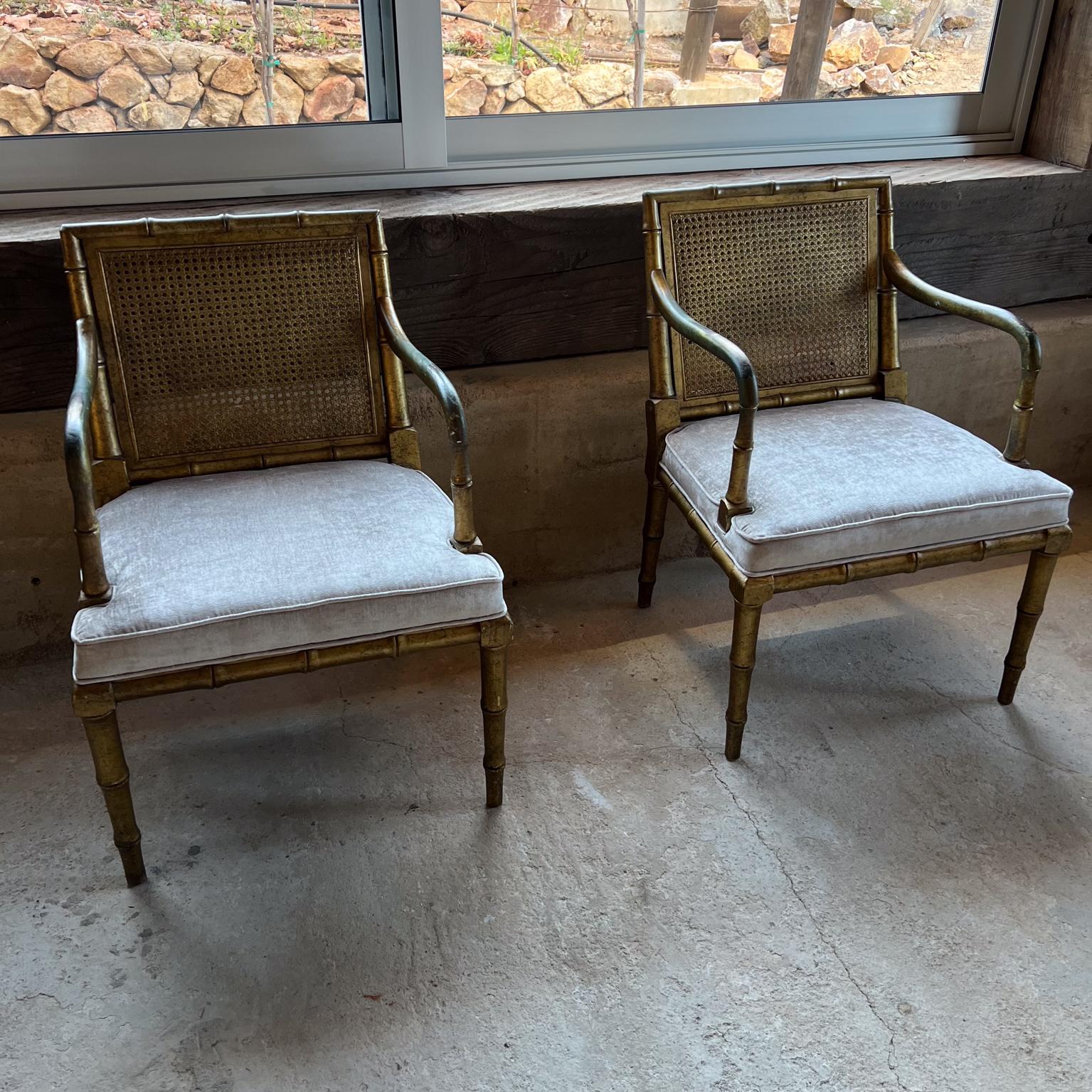 AMBIANIC presents
Pair of Gilded Faux Bamboo Hollywood Regency Style Armchairs
Attribution Hickory Chair Company
No label present.
Original gold leaf finish with vintage patina (unrestored)
New upholstered seat and fabric.
Wear is present on the