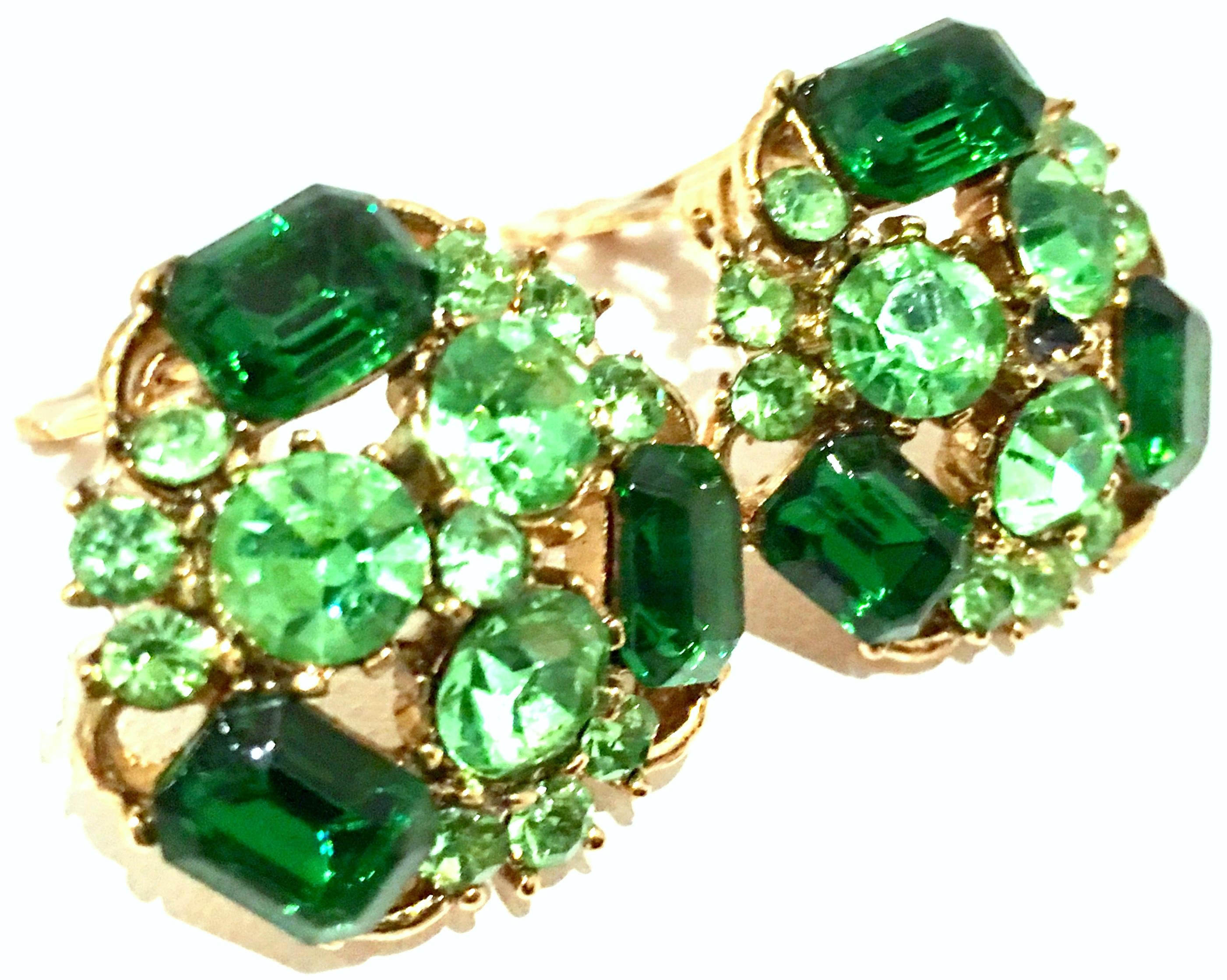 1960'S Gold plate & Austrian Crystal Earrings. Features prong set brilliant cut and faceted rectangular and round stones in two shades of green.