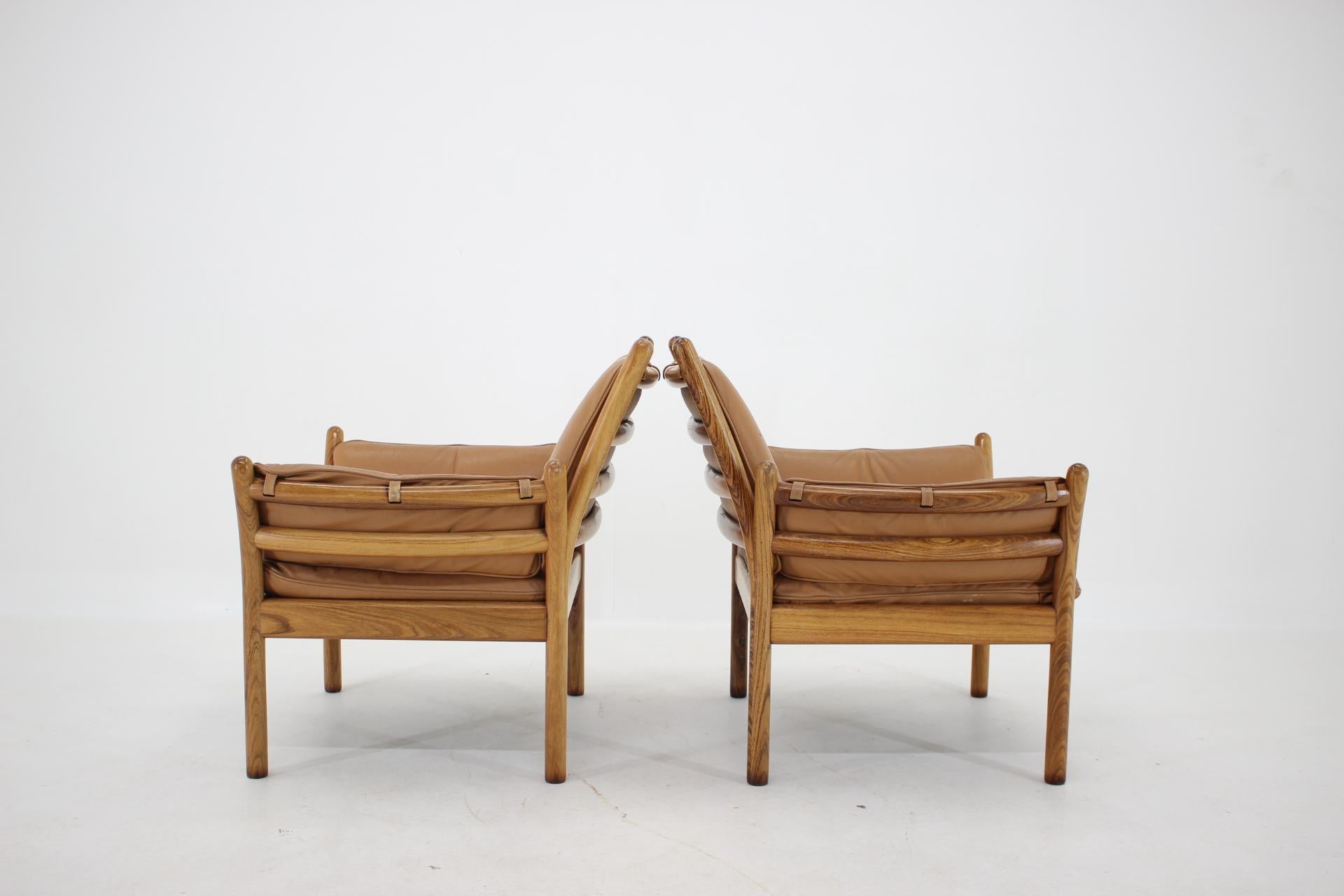 1960s Pair of Illum Wikkelsø Genius Leather Palisander Armchairs with Stools, De 3