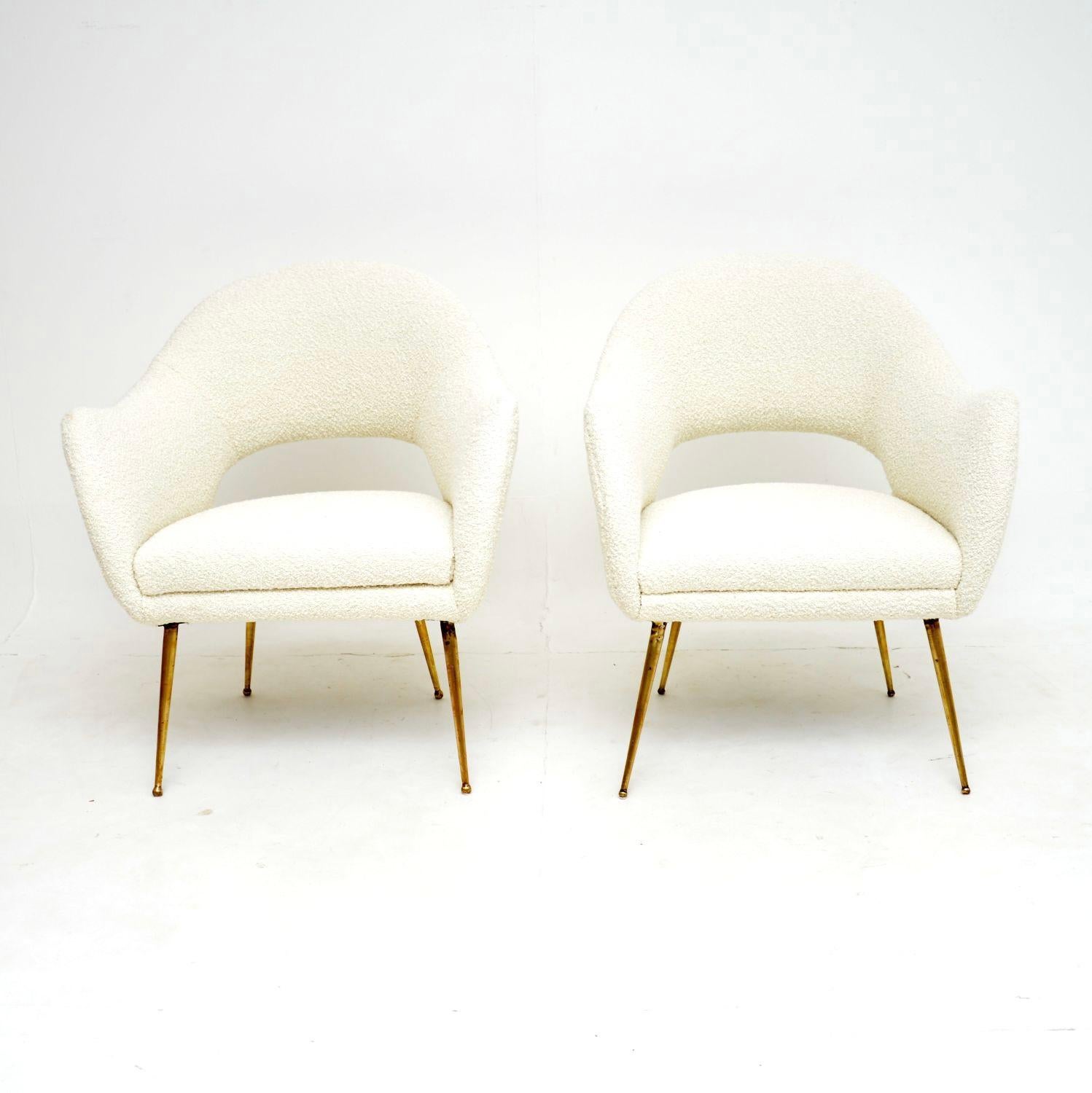 A stunning pair of vintage Italian armchairs in boucle wool and brass. They were recently imported from Italy, and they date from the 1960’s.

They are a lovely size, beautifully designed and are of great quality. The scooped seat frames sit on