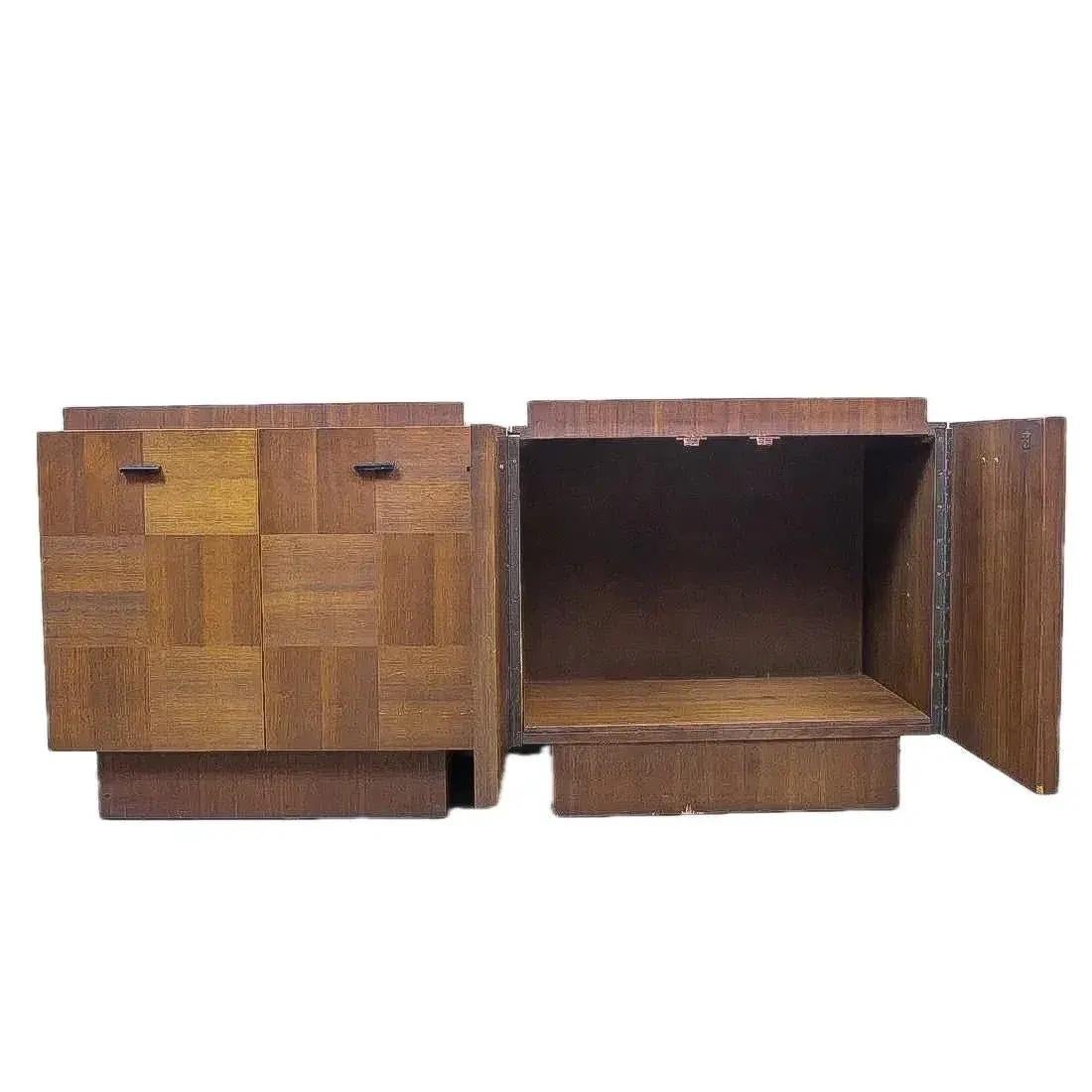 A pair of Midcentury Modern nightstands with veneered walnut fronts and panels in alternating grain. They have an attractive, Brutalist patchwork quilt design on the front. Possibly from the Staccato line by Lane. Condition consistent with age.