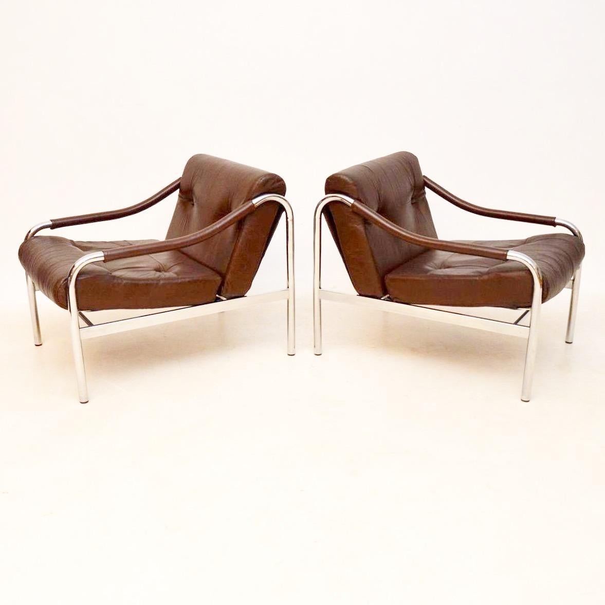 A stunning pair of vintage armchairs in tubular steel and brown leather. They date from the 1960s-1970s, they were made by Pieff in England and this model is called the 'Beta' armchair. The condition is superb for their age, they are clean, sturdy