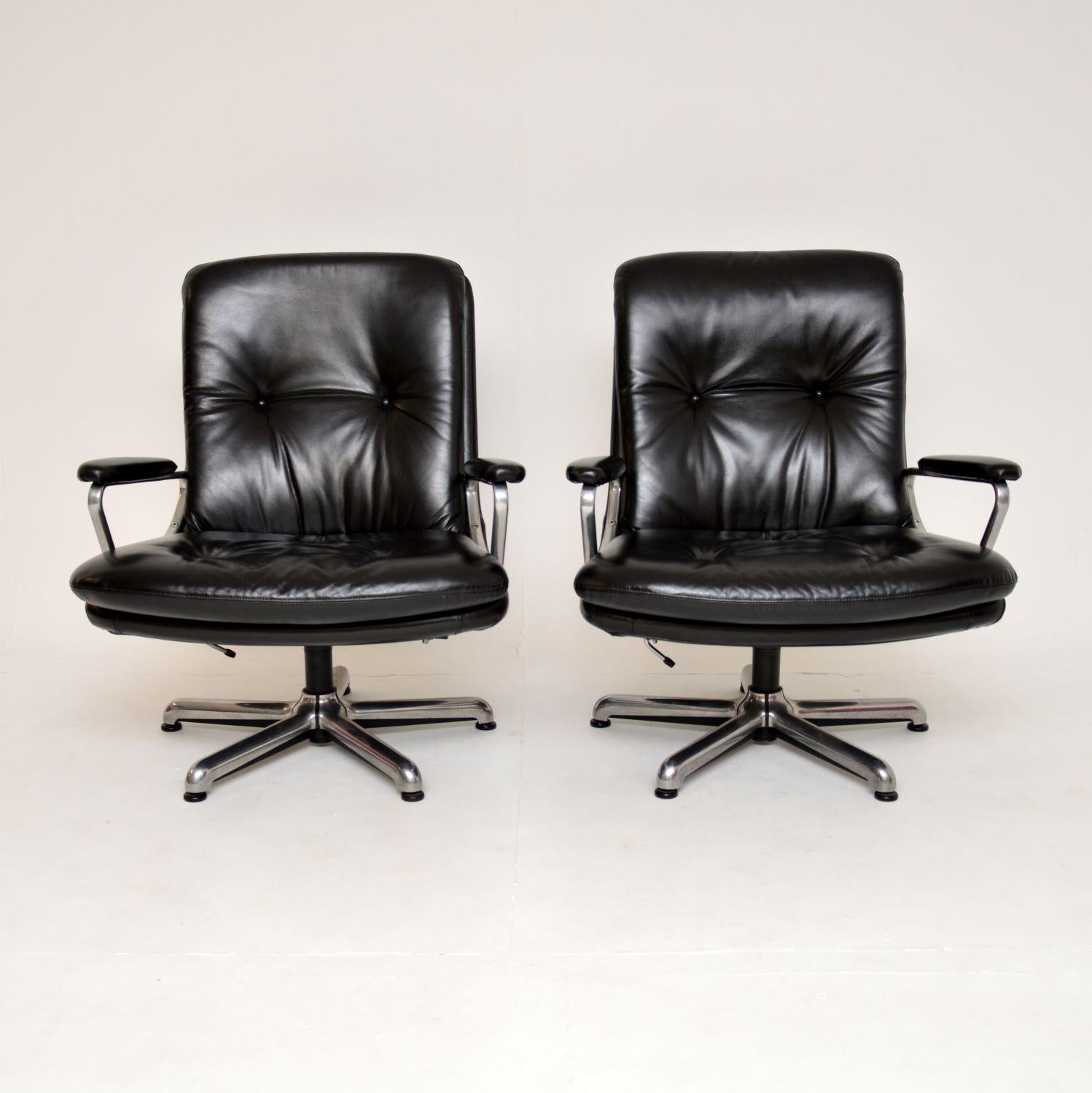 A superb pair of vintage leather and chrome swivel armchairs. They were made in Sweden in the 1960’s by Strassle, and were designed by Andre Vandenbeuk.

The quality is exceptional and they are extremely comfortable. They swivel on splayed chrome