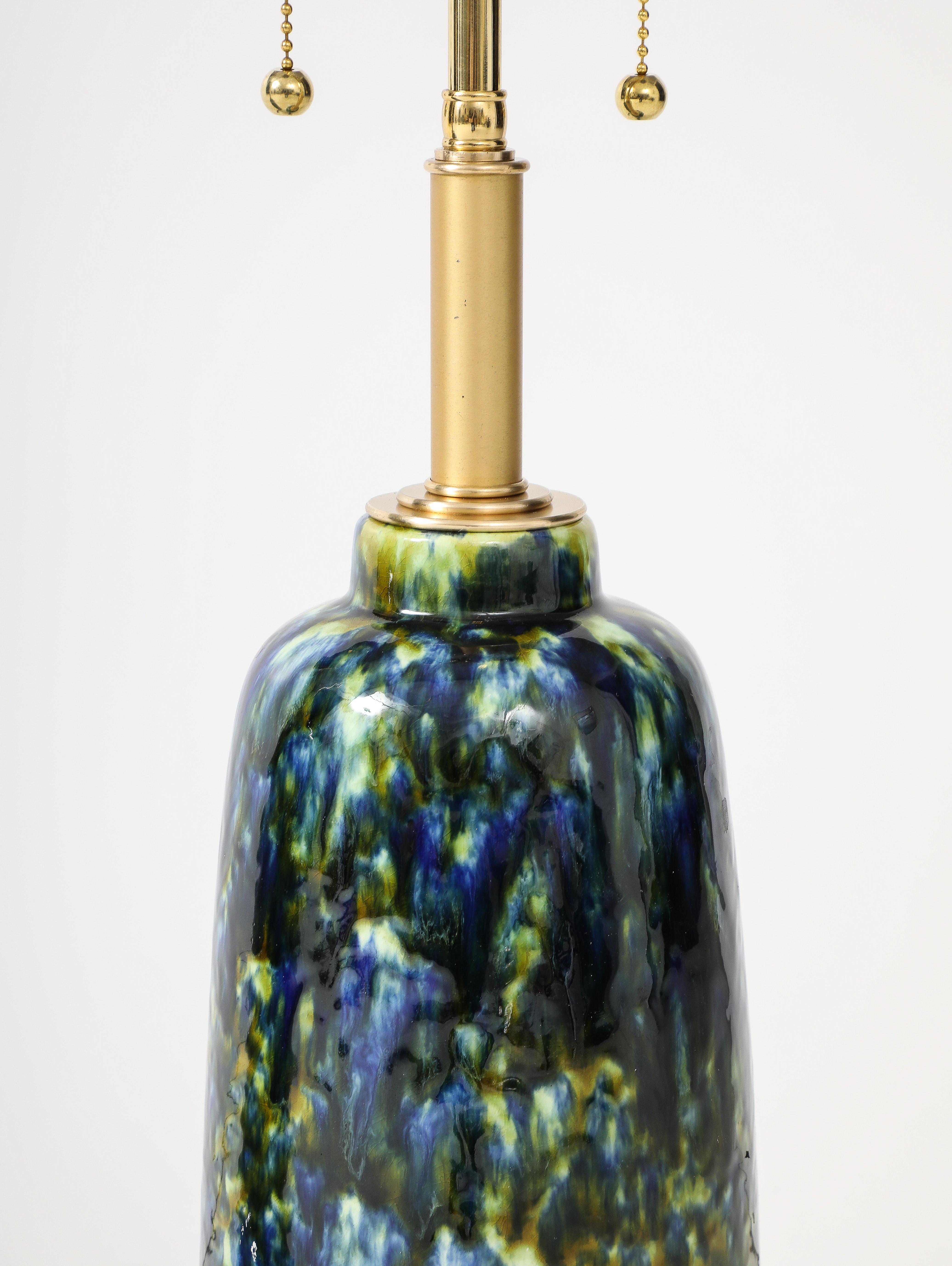 Polished 1960's Pair of Mid -Century Ceramic Lamps with a Beautiful Peacock Glaze. For Sale