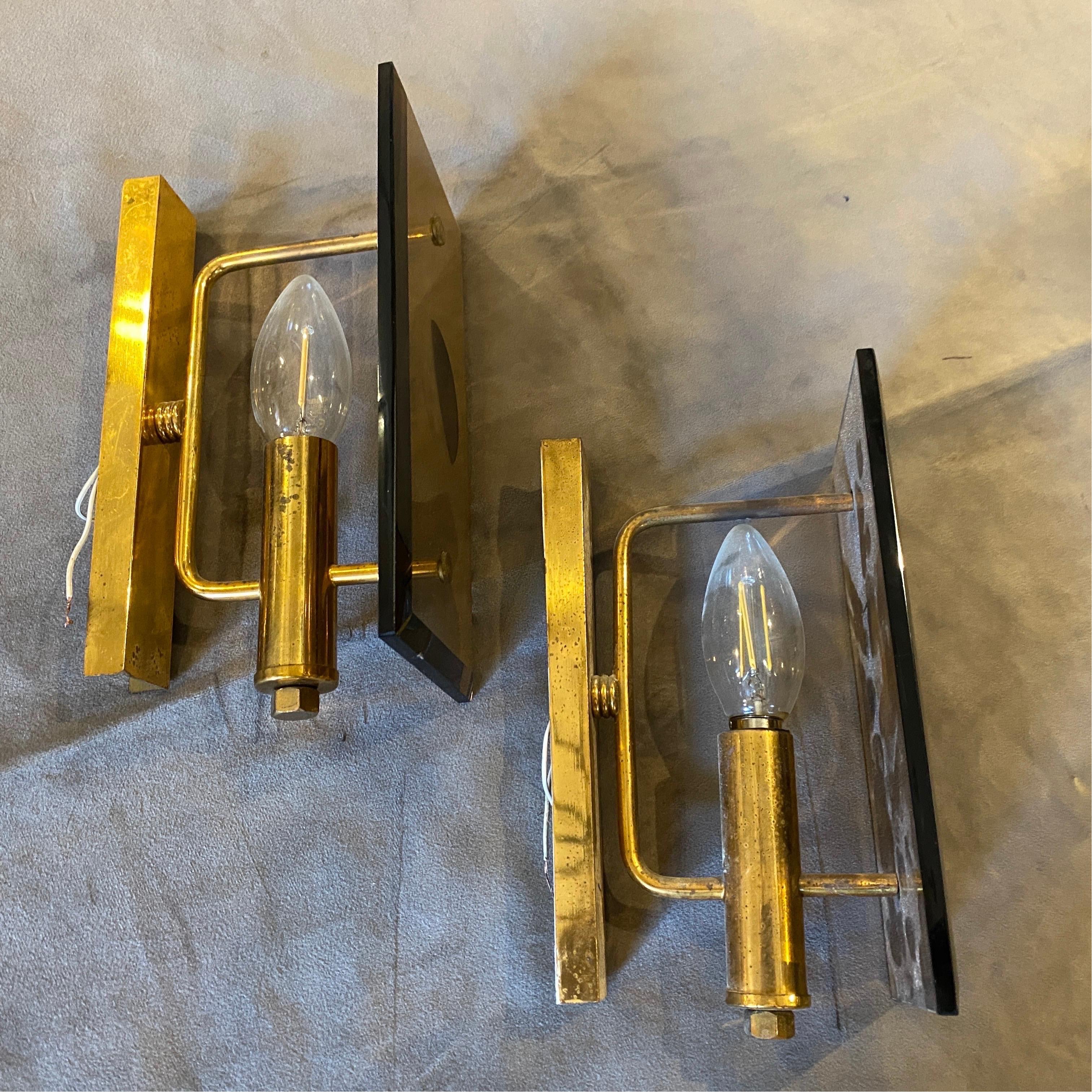 20th Century 1960s Pair of Mid-Century Modern Brass and Smoked Glass Italian Wall Sconces For Sale