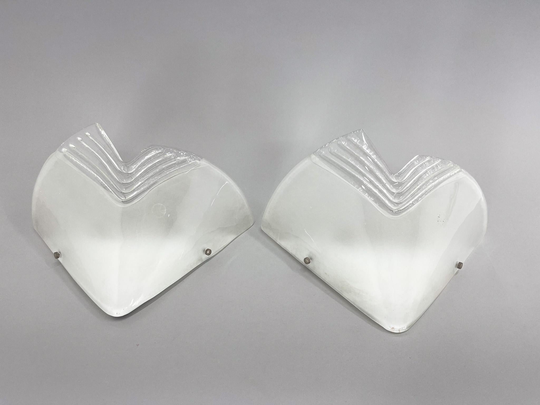 Set of two beautiful vintage Murano Glass Wall Lights. Made in Italy in the 1960's. 
Original label.