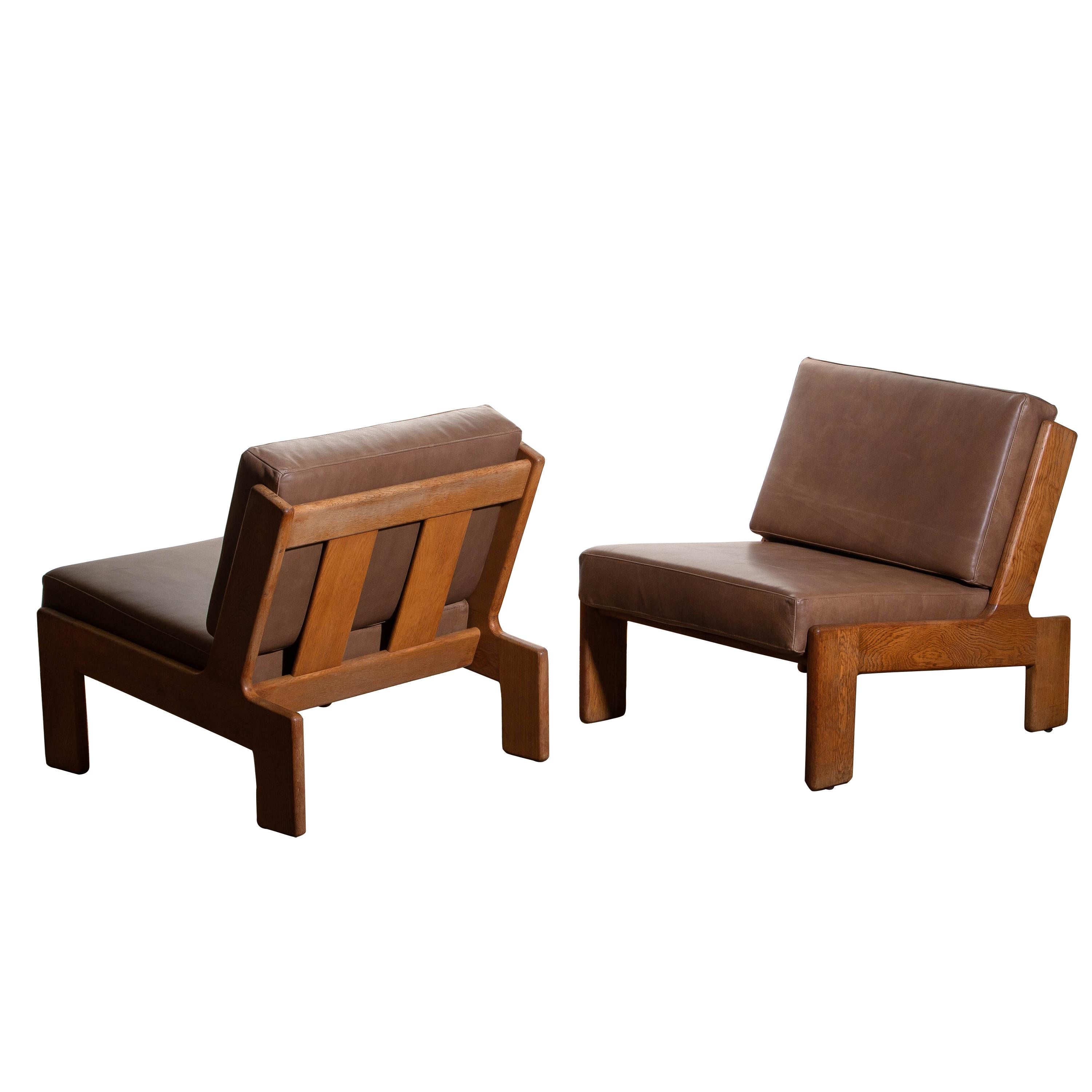 Mid-Century Modern 1960s, Pair of Oak and Leather Cubist Lounge Chairs by Esko Pajamies for Asko