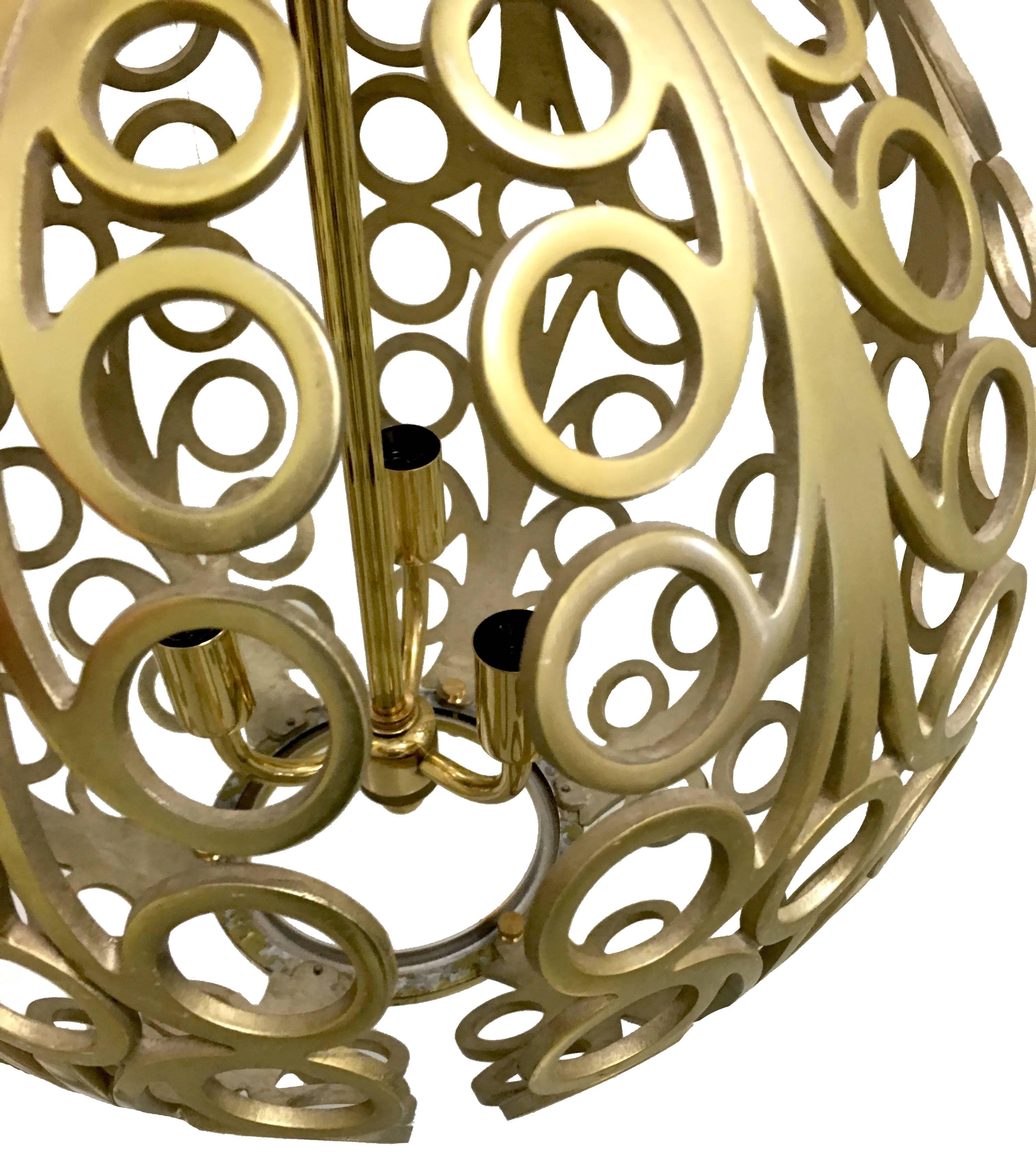 American 1960s Pair of Pierced Brass Geometric Pendant Lights For Sale