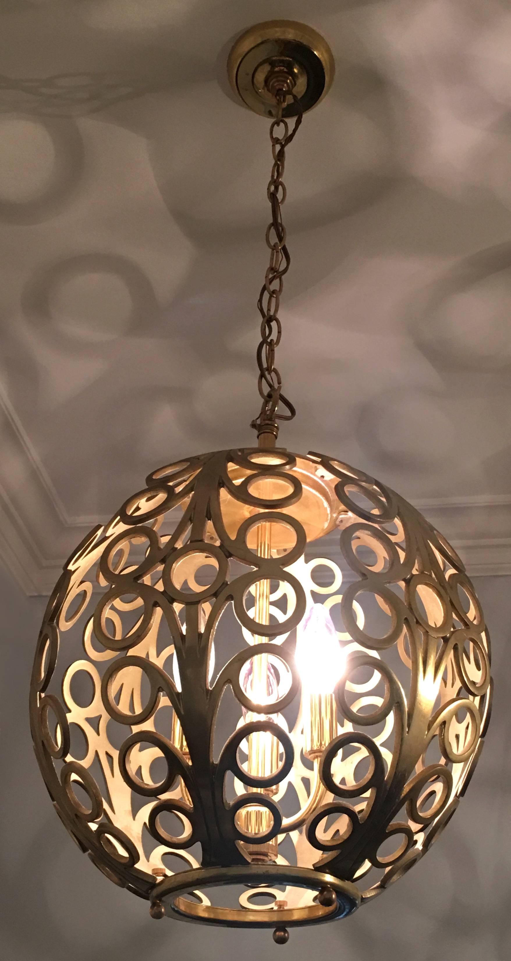 20th Century 1960s Pair of Pierced Brass Geometric Pendant Lights For Sale