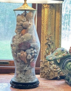 1960s pair of royal leerdam / Blenko hurricane shell filled lamps