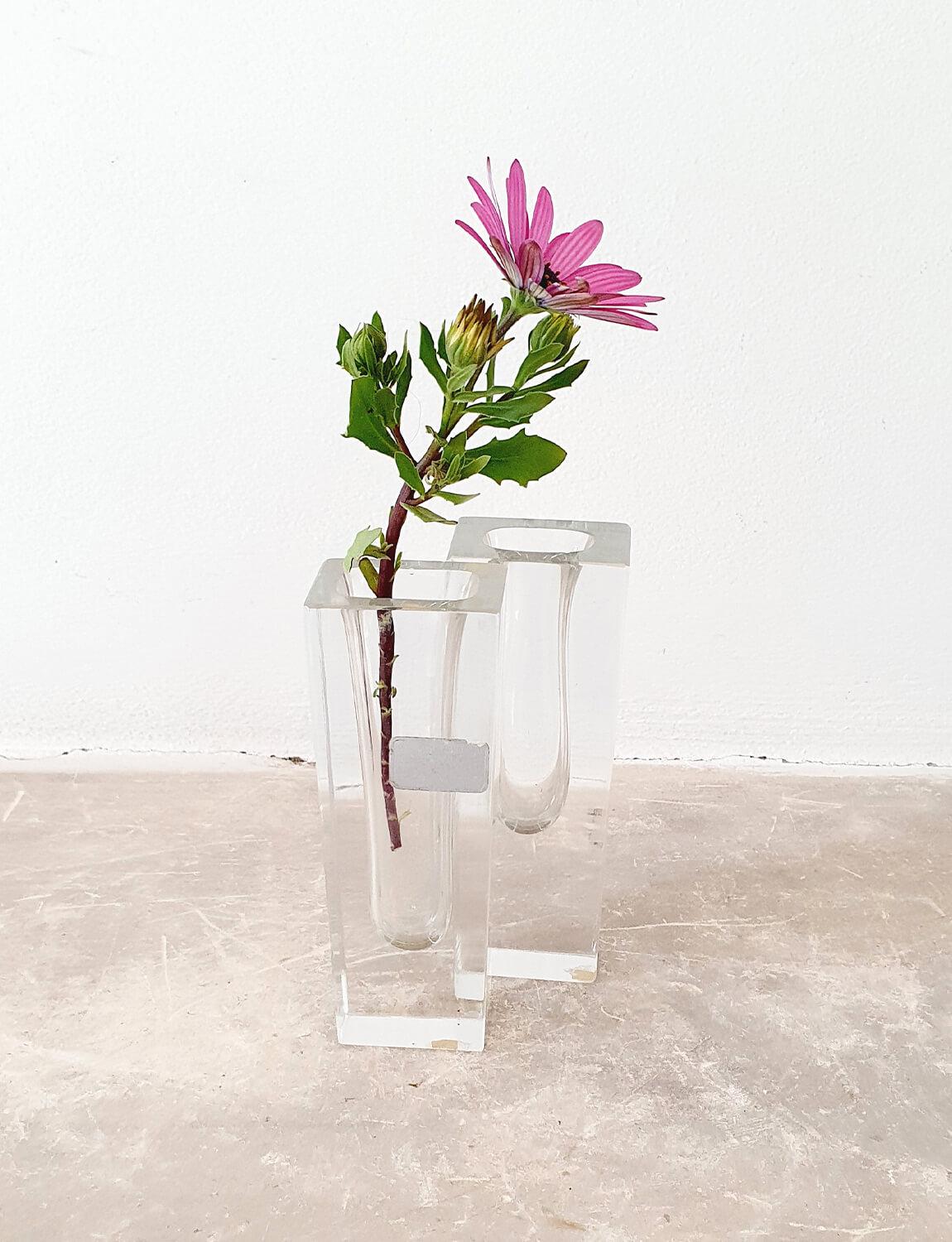 A pair of 1960s piccolo transparent glass Murano geometric vases designed by Alessandro Mandruzzato and found here in Italy. Both vases are in very good condition with their original sticker still intact.

Dimensions: H16cm X W6cm X D4cm