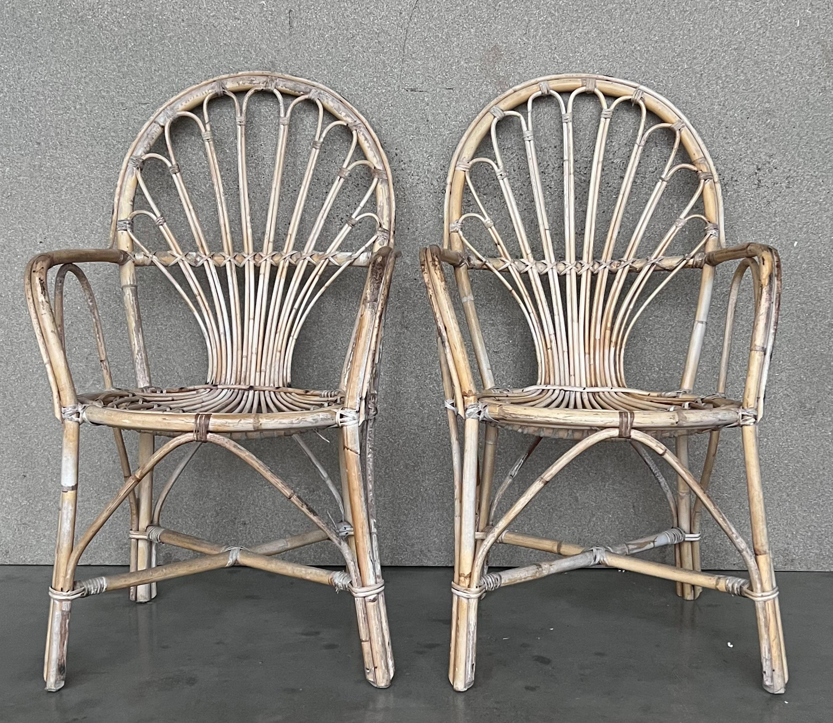 1960s pair of Spanish bamboo armchairs with Ovaled back rest
Restored.