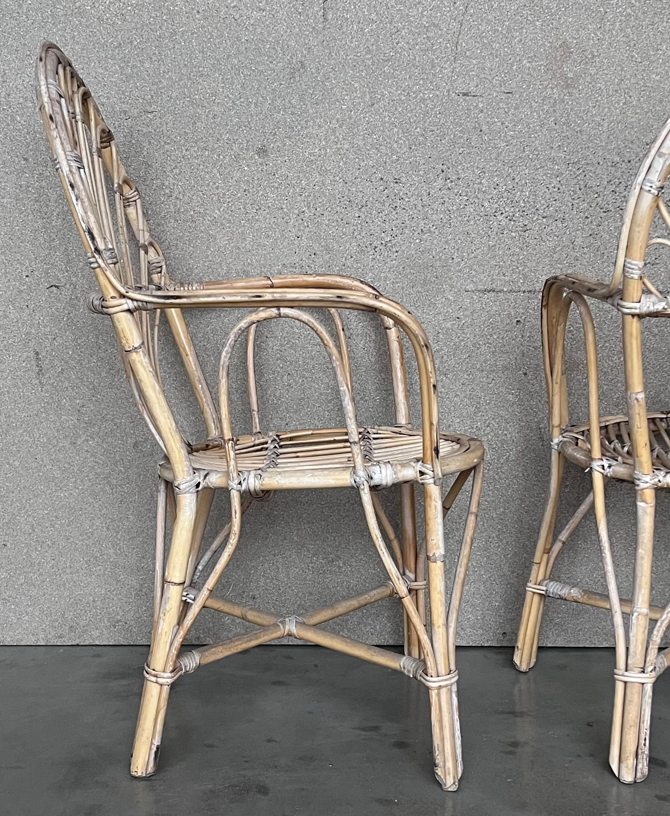 Paire de fauteuils espagnols en bambou des années 1960 avec dossier ovale en vente 1