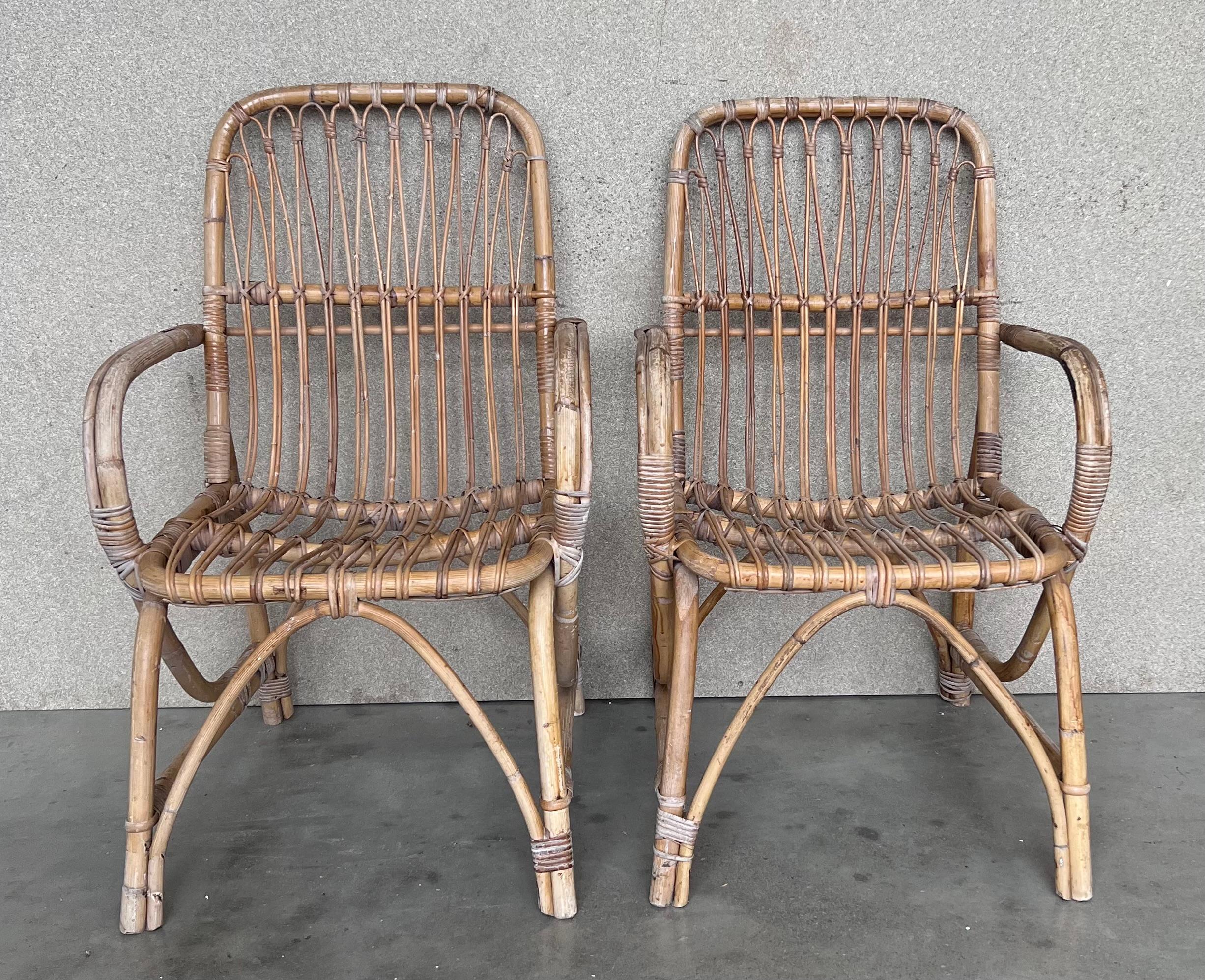 1960s pair of Spanish bamboo armchairs with Rectangular back rest.
Restored.

