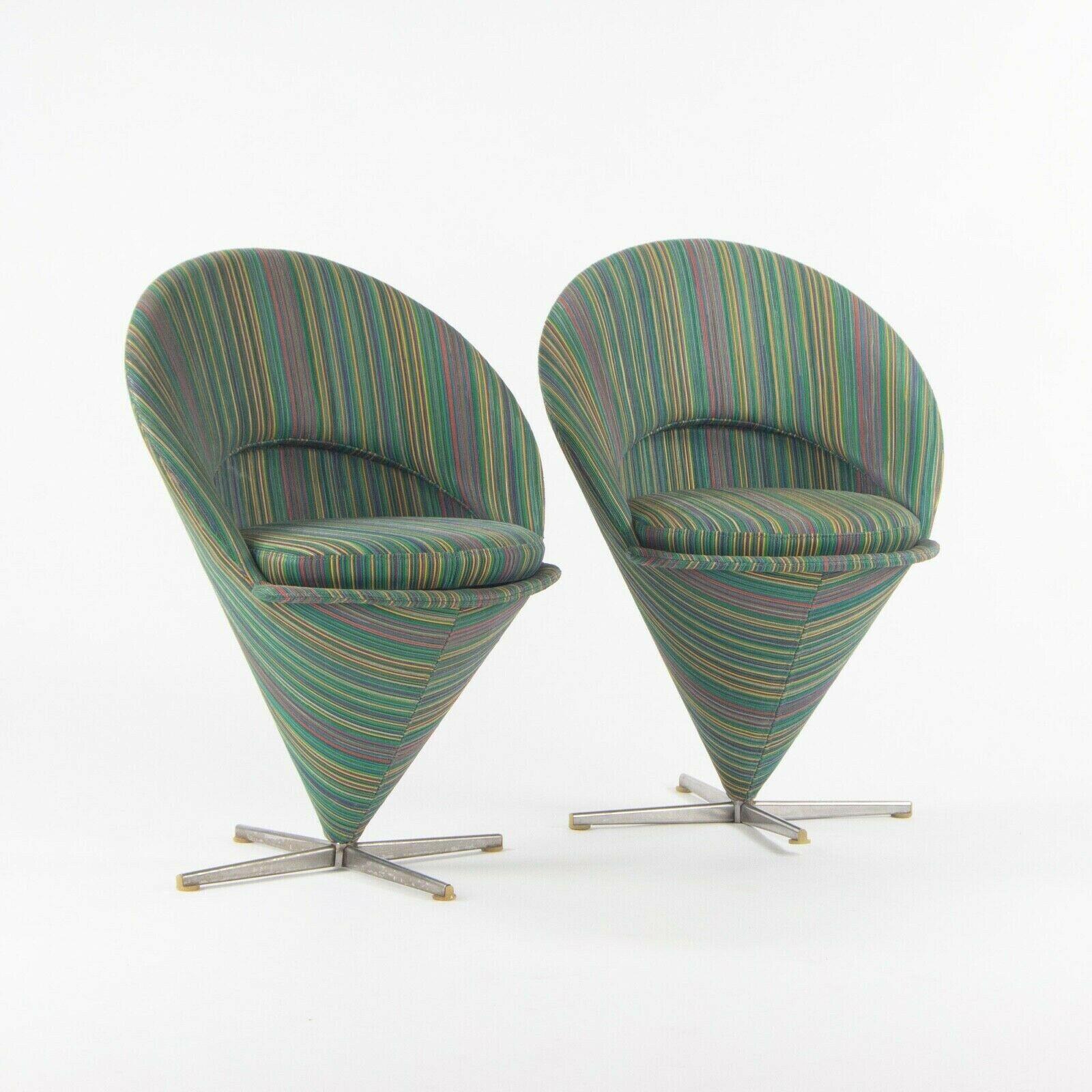 Listed for sale is an original pair of cone chairs, designed by Verner Panton and produced by Plus-Linje. Whereas the current variations and now produced by Vitra, this early example was produced by the lesser known Plus-Linje company. The cone