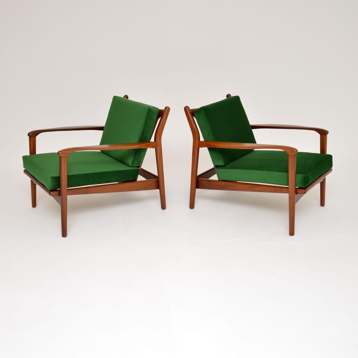 A very stylish, comfortable and extremely well made pair of armchairs in solid afromosia wood. These were made by Toothill furniture in England, they date from the 1960’s.

They are of amazing quality with a beautiful design, these were originally