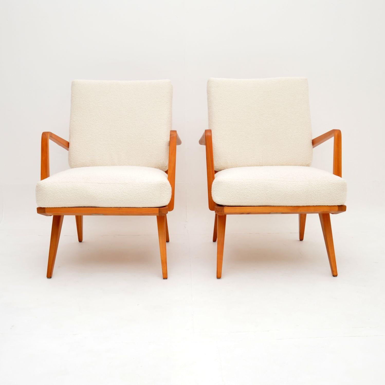 A stylish and very rare model, this pair of solid cherry wood armchairs were made in Germany by Wilhelm Knoll in the 1960’s.

They are of amazing quality and are very comfortable, with a beautiful design. The frames have stunning angles, the cherry