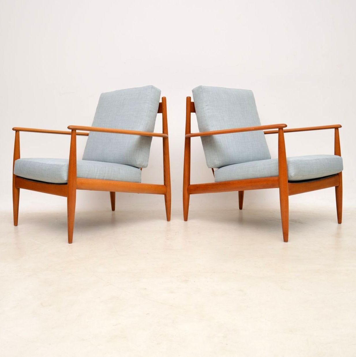 A stylish and extremely well made pair of Danish vintage armchairs, these date from the 1960s. We have had the frames completely stripped and re-polished to a very high standard, the condition is amazing and they have a lovely, warm color. The