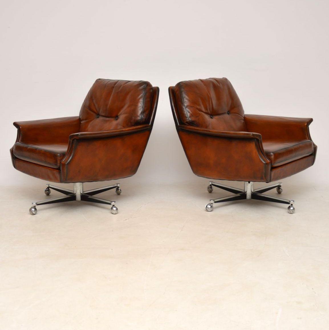 A beautiful and extremely comfortable pair of vintage leather swivel armchairs, sitting on splayed chrome bases. They date from the 1960-70’s, these are of amazing quality and are in superb condition for their age. We have had these professionally