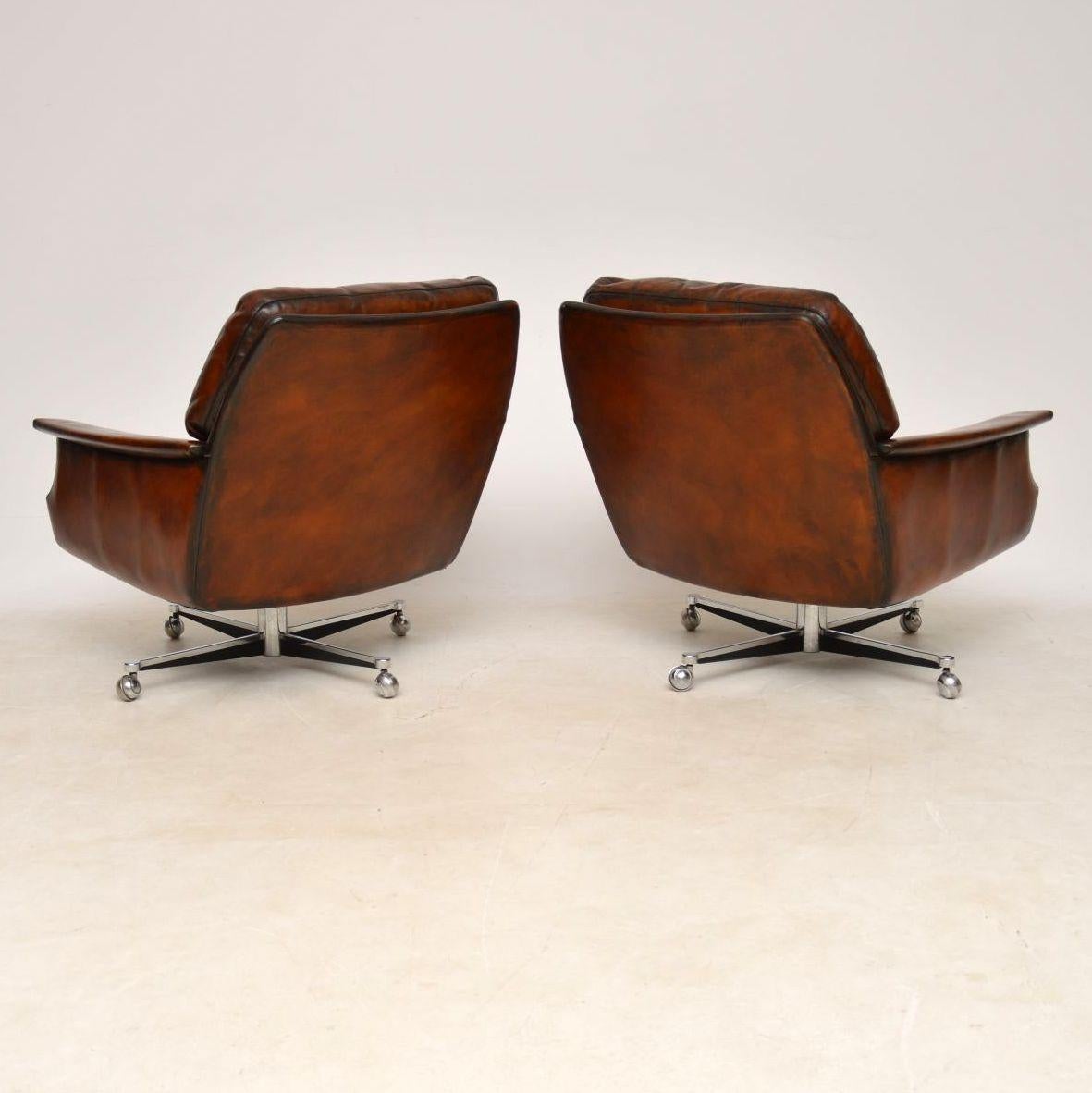 Mid-20th Century 1960s Pair of Vintage Leather and Chrome Swivel Armchairs