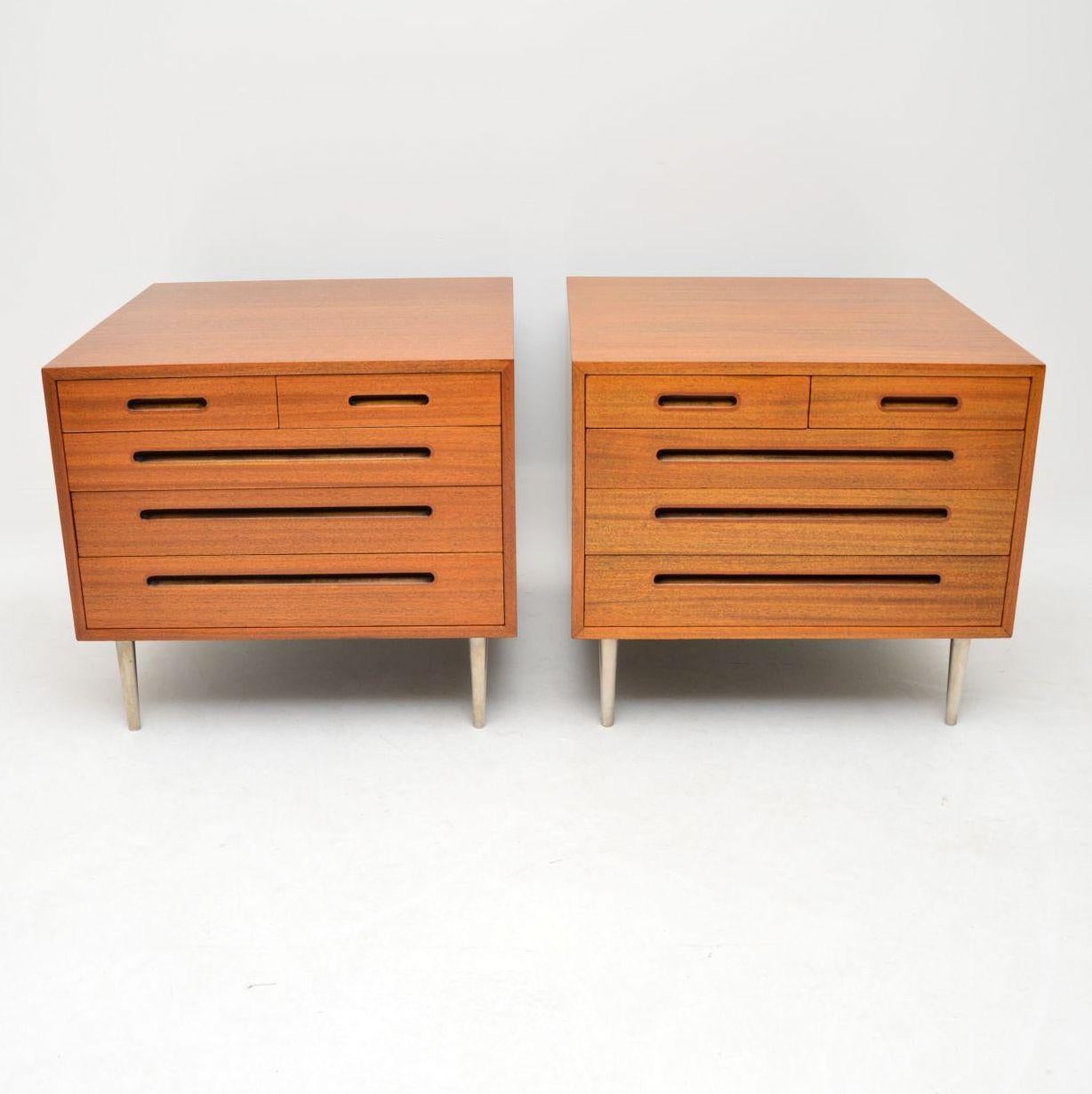 A magnificent pair of vintage mahogany chests, these were made in the USA by Dunbar furniture, they were designed by Edward Wormley. Edward Wormley was one of the leading pioneers of Mid-Century Modern design in America, his designs are highly