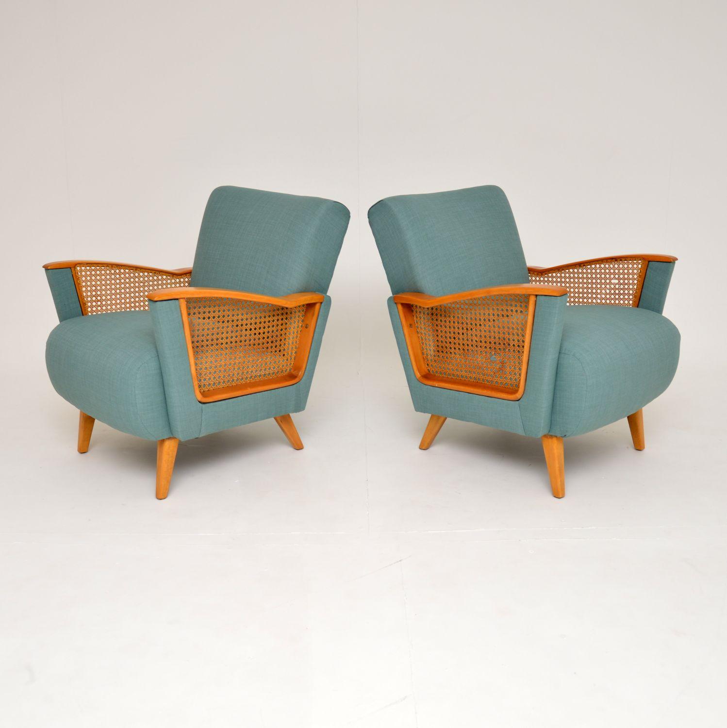 A stylish and extremely comfortable pair of vintage Swedish armchairs. These were recently imported from Sweden, they date from the 1960’s.

They have lovely light beech wood wood frames with cane sides, and sit on elegant yet sturdy tapered