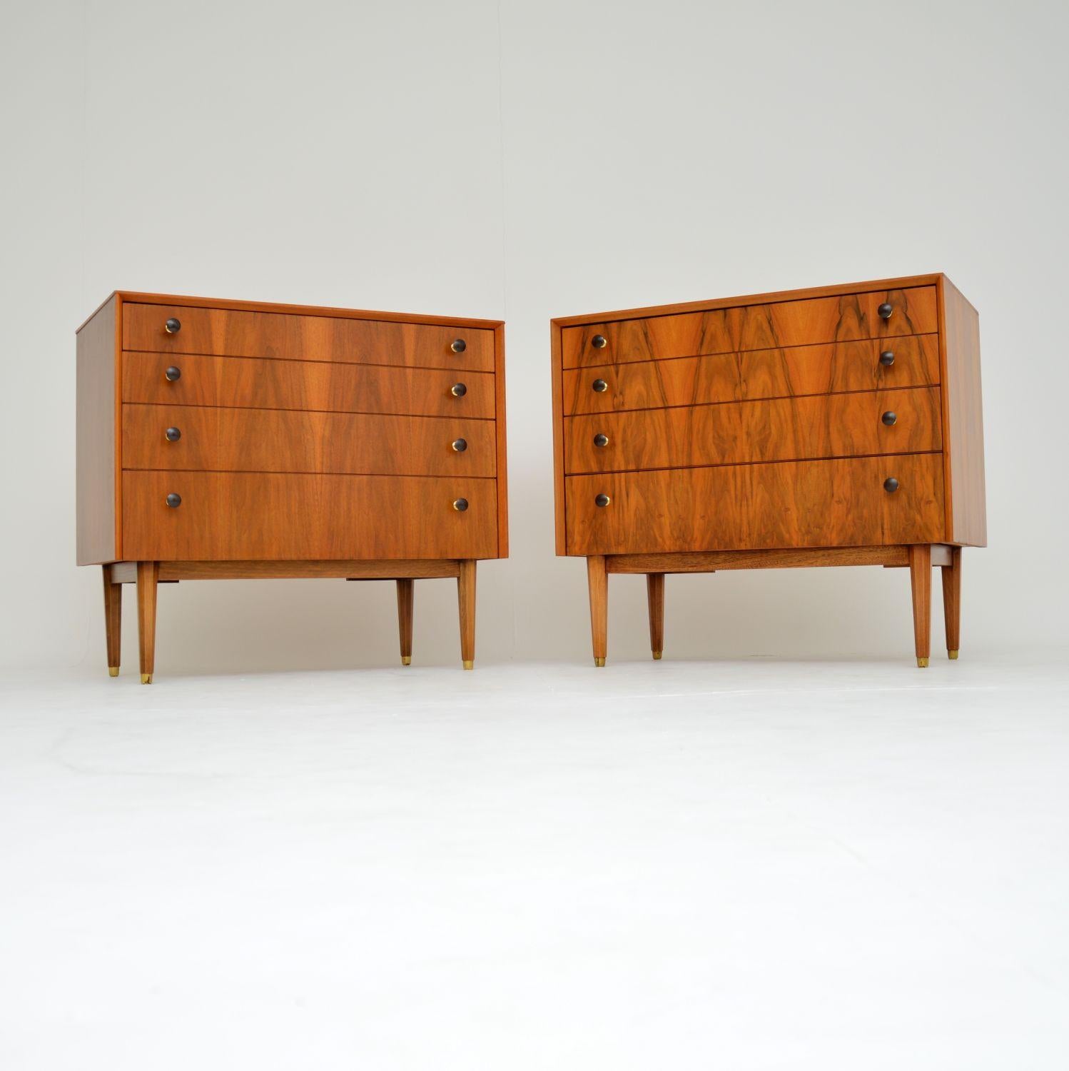 A stylish and very rare pair of walnut chests of drawers. These were made by G Plan, they date from the 1960s.

They are a fantastic Size and are of amazing quality. The walnut is richly figured with stunning grain patterns, and a beautiful, warm