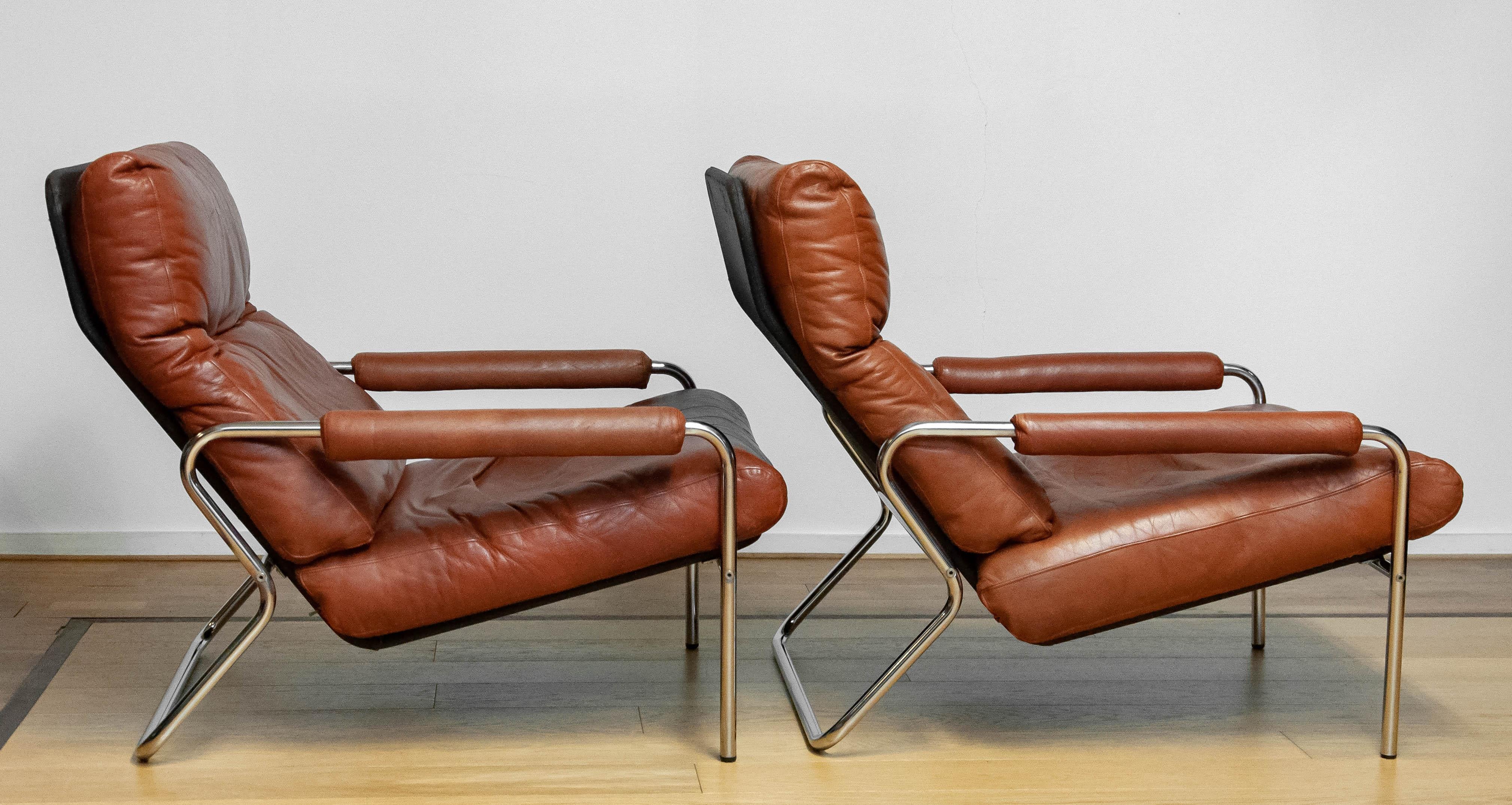 Swedish 1960s Pair Scandinavian Modern Tubular Chrome And Brown Leather Lounge Chairs