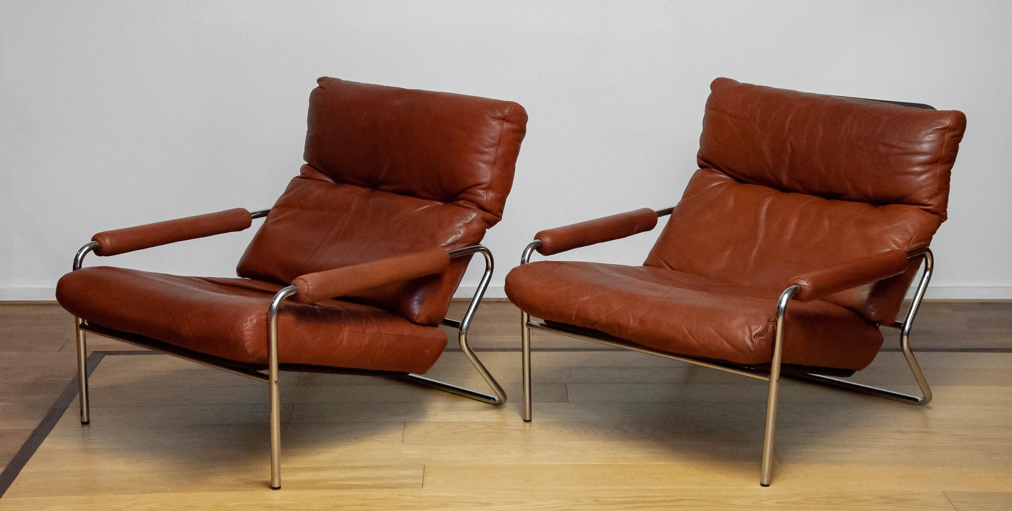 Mid-20th Century 1960s Pair Scandinavian Modern Tubular Chrome And Brown Leather Lounge Chairs