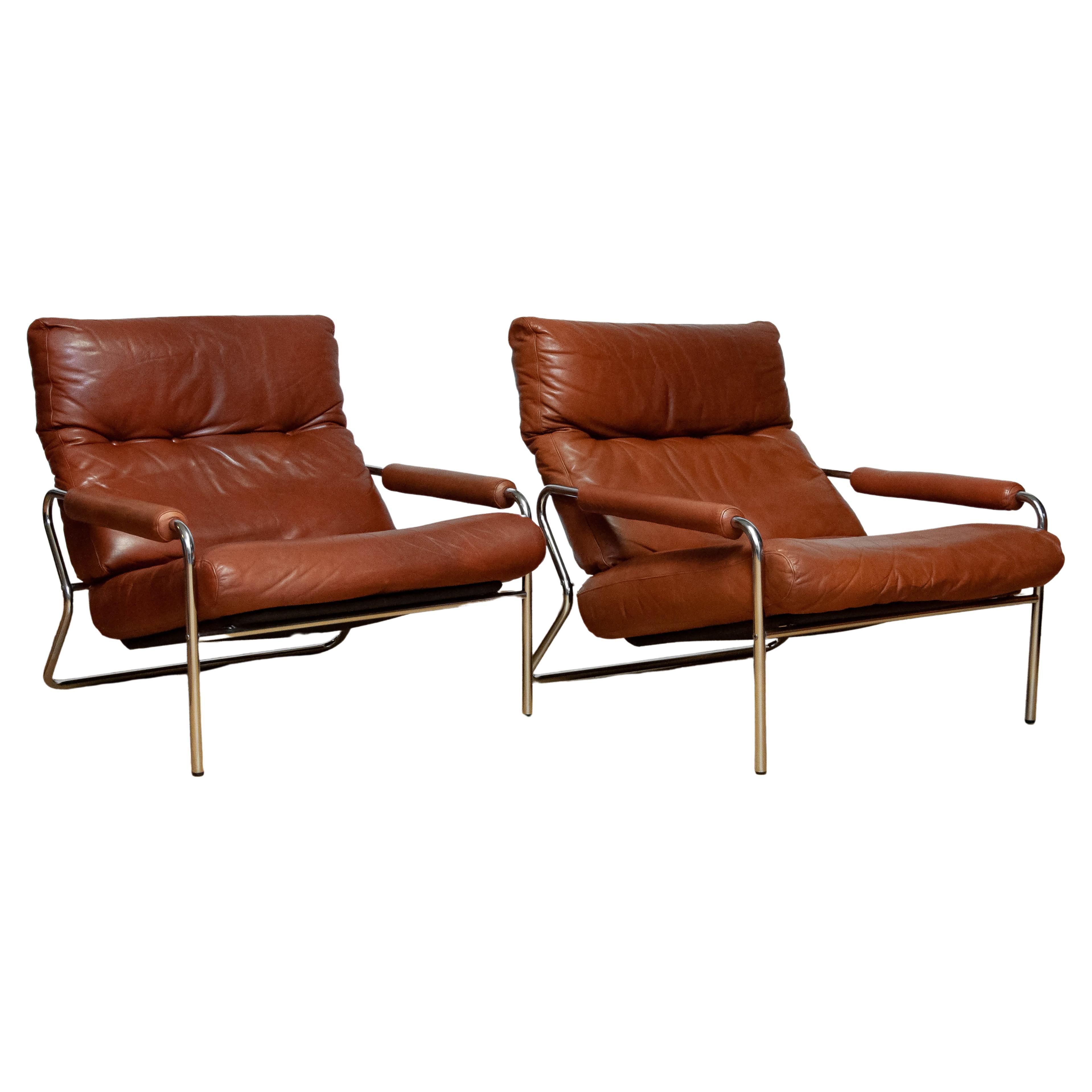 1960s Pair Scandinavian Modern Tubular Chrome And Brown Leather Lounge Chairs