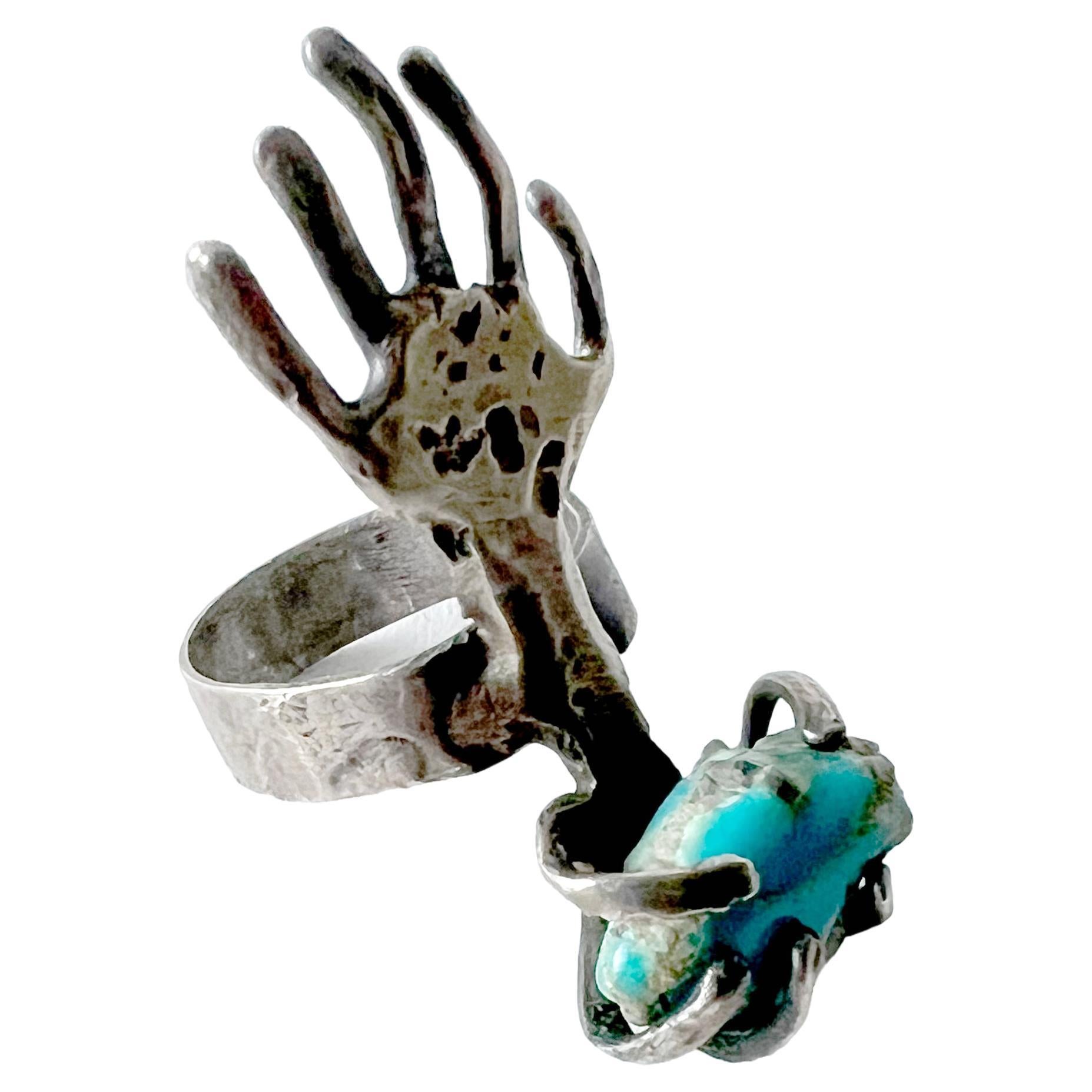 Artisan 1960s Pal Kepenyes Mexican Surrealist Silver Turquoise Arm With Hand Ring  For Sale