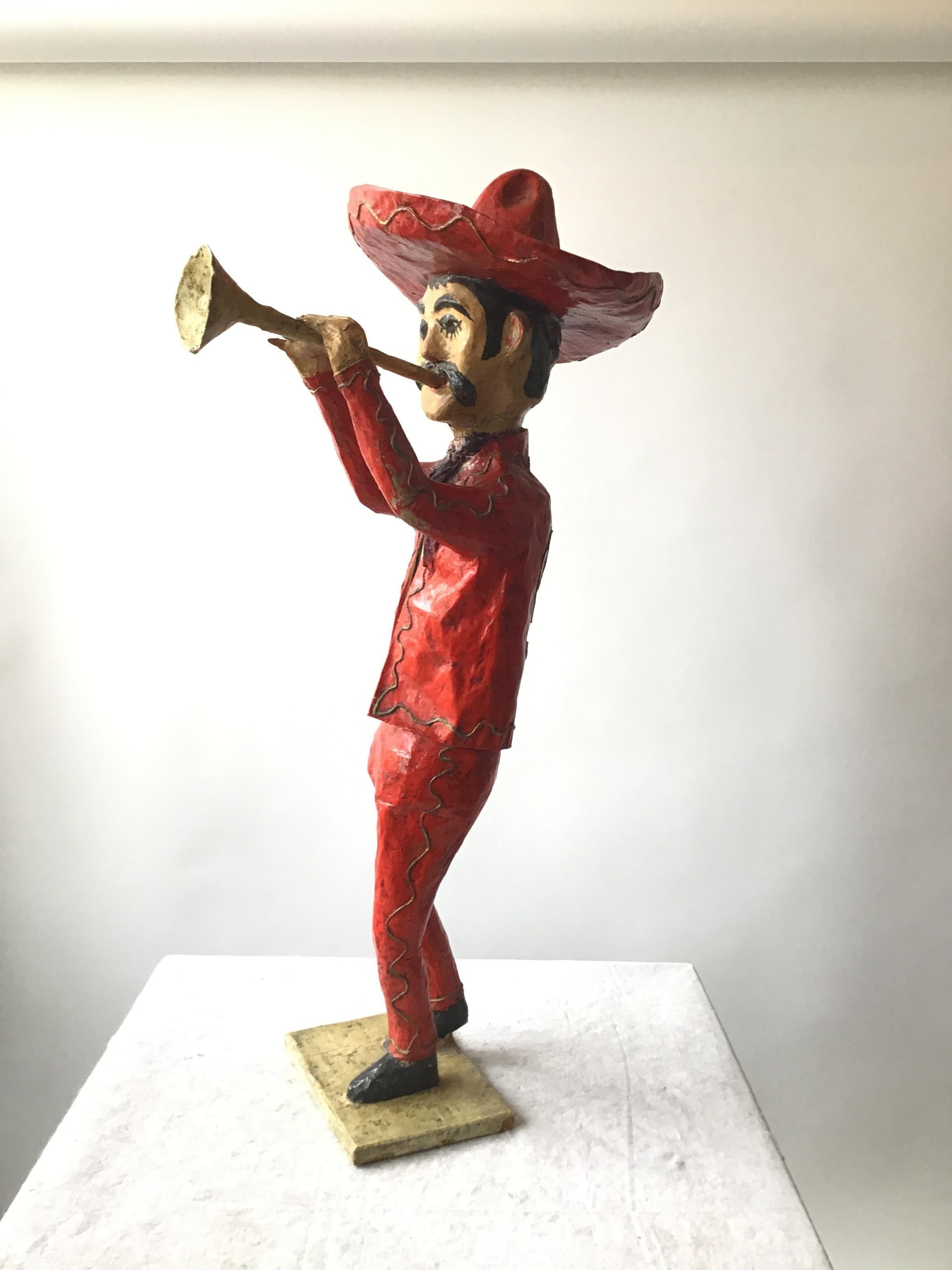 1960s paper mâché  horn player. Made in Mexico.