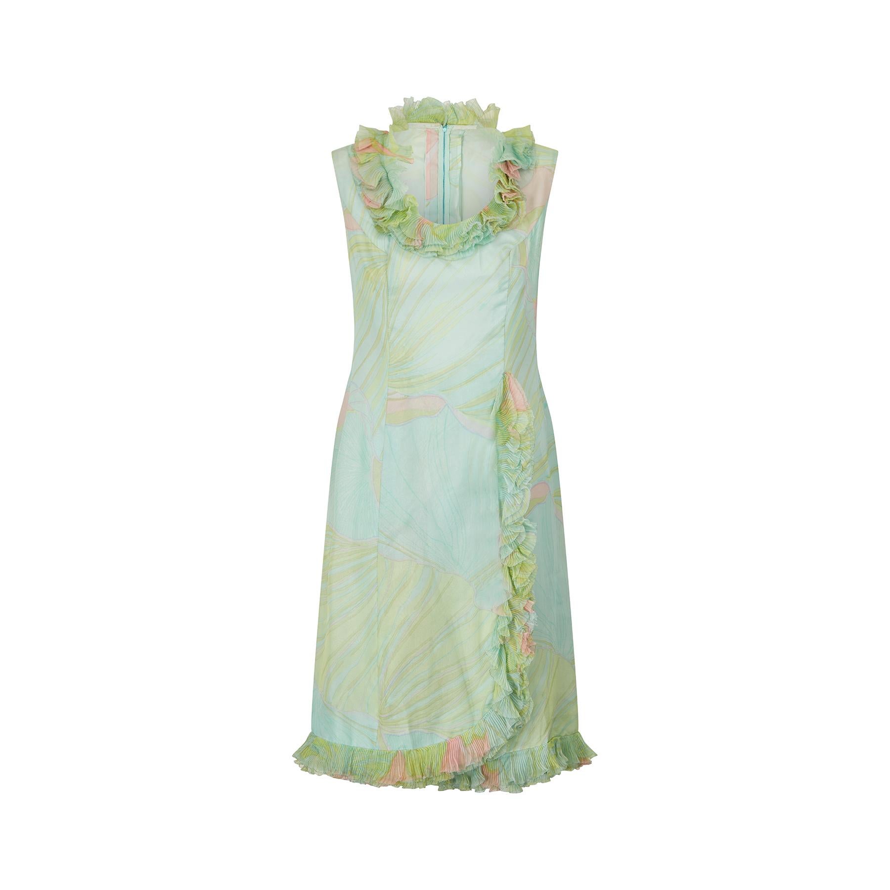 This original vintage French couture dress is made from a very high quality mint green silk chiffon, with an abstract swirl print in pale blue, pink, lime and peach shades. Cut in a classic 60s shift shape, it was almost certainly made by someone