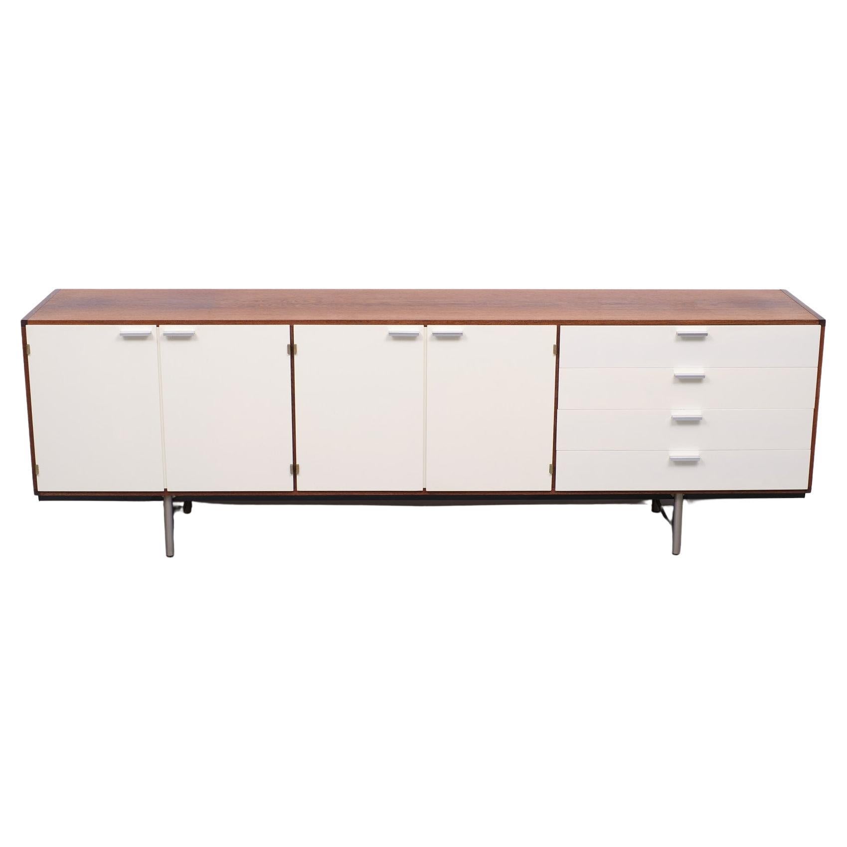 Wenge sideboard by Cees Braakman for Pastoe. This sideboard is from the Made-to-measure CR-serie. It has removable and height adjustable shelves inside. The top drawer has its original cutlery compartment. One drawer has a makers label and inside