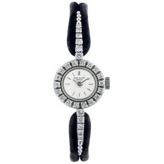 Patek Philippe Montre-bracelet à motif de barre flottante en platine et diamants, années 1960