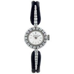 Patek Philippe: Platin-Armbanduhr mit schwebendem Diamant-Bar-Motiv, 1960er Jahre